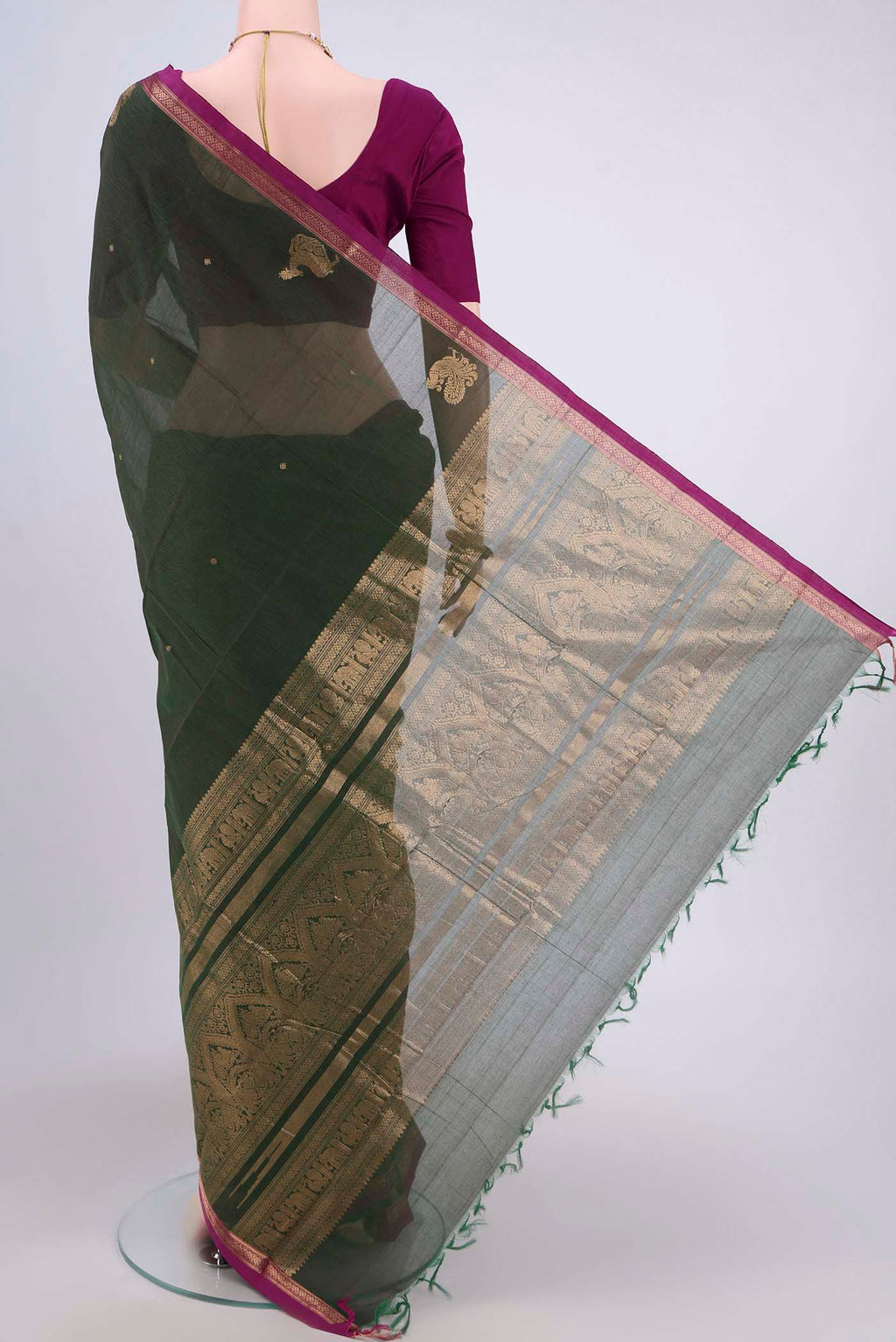 Flat view of Green Kanchi Cotton Saree with Zari Butta on the body and Zari Border. 