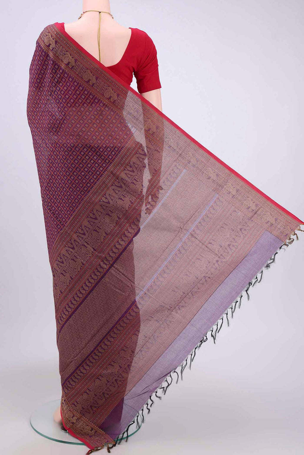 Flat view of Dark Mauve Kanchi Cotton Saree with Checked design on the body and Thread Border. 