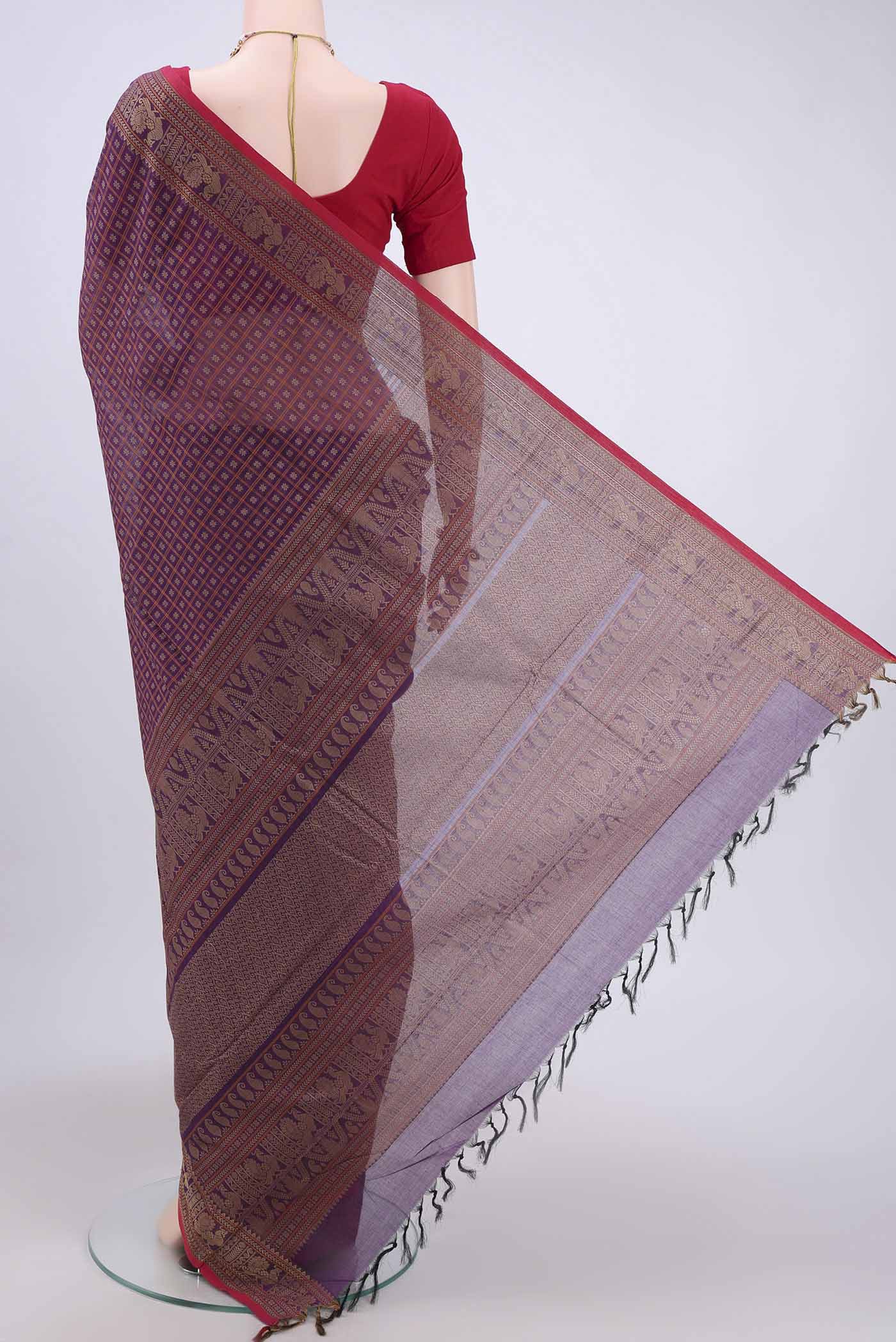 Flat view of Dark Mauve Kanchi Cotton Saree with Checked design on the body and Thread Border. 