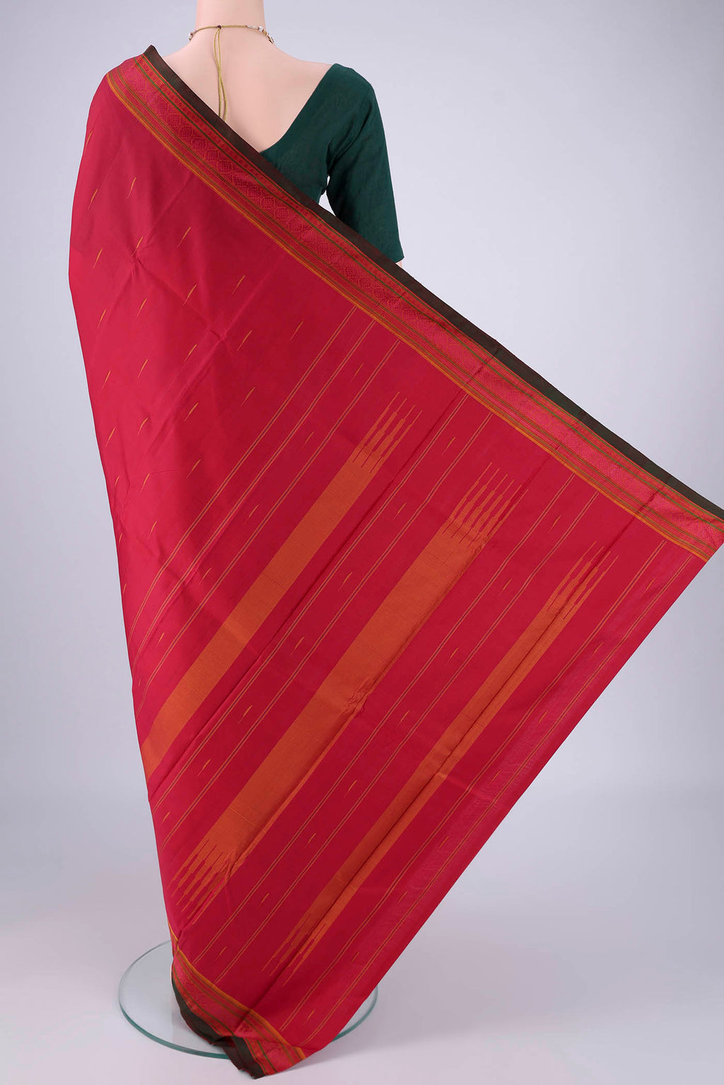 Flat view of Maroon Kanchipuram Silk Saree with Thread Butta on the body and Thread Border. 