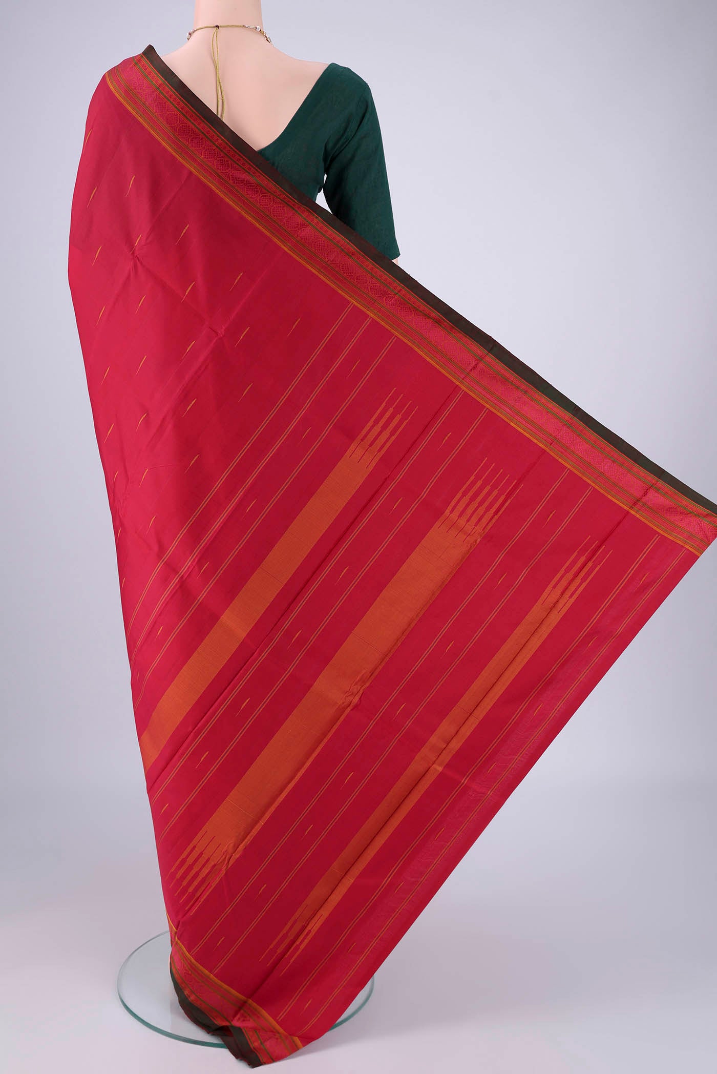 Flat view of Maroon Kanchipuram Silk Saree with Thread Butta on the body and Thread Border. 