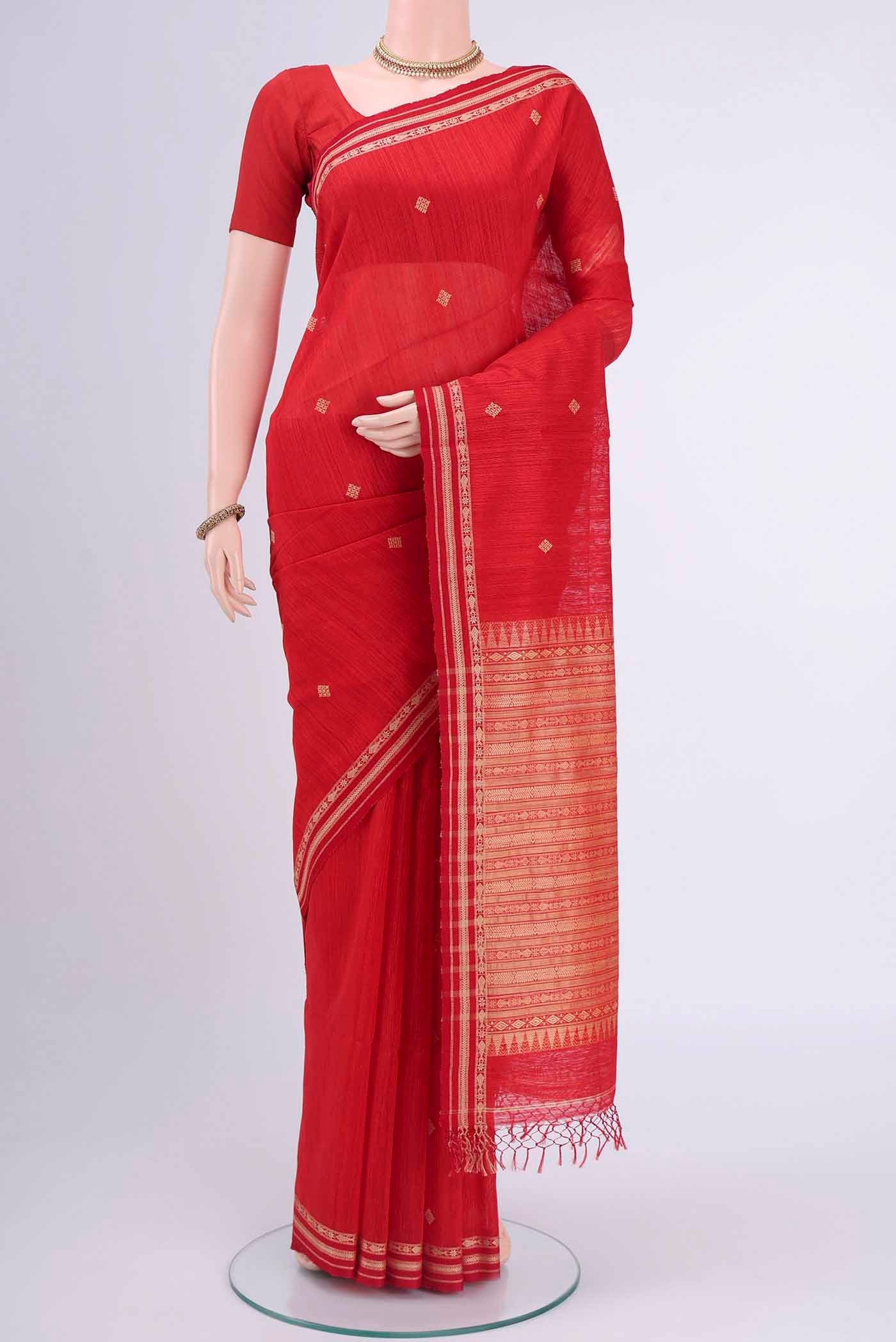 Red Tussar Silk Saree with Jamdani on the body and Plain Border displayed on a mannequin