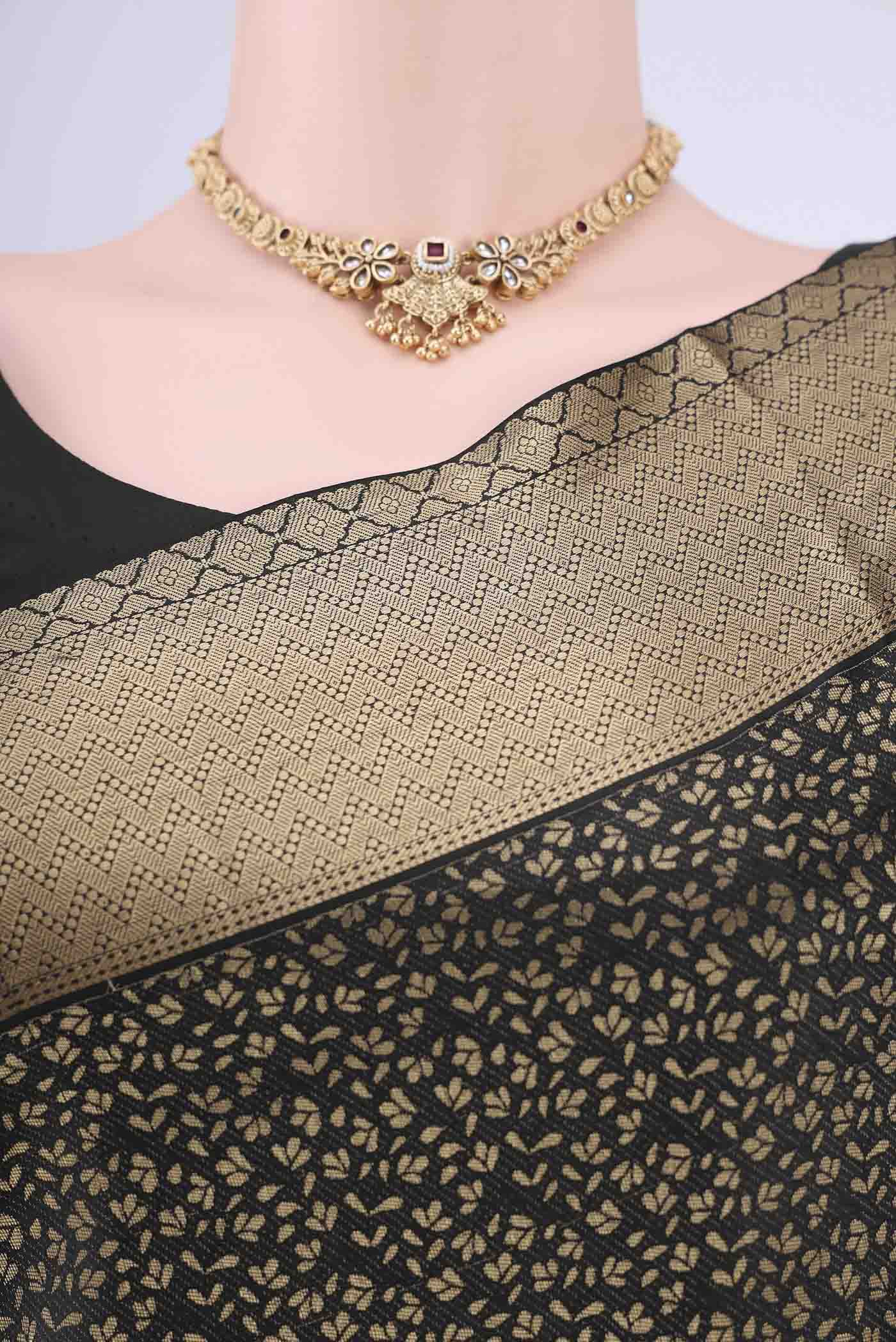 Border image of Black Soft Silk Saree with Jacquard design on the body and Thread Border