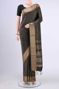 Black Soft Silk Saree with Jacquard design on the body and Thread Border displayed on a mannequin