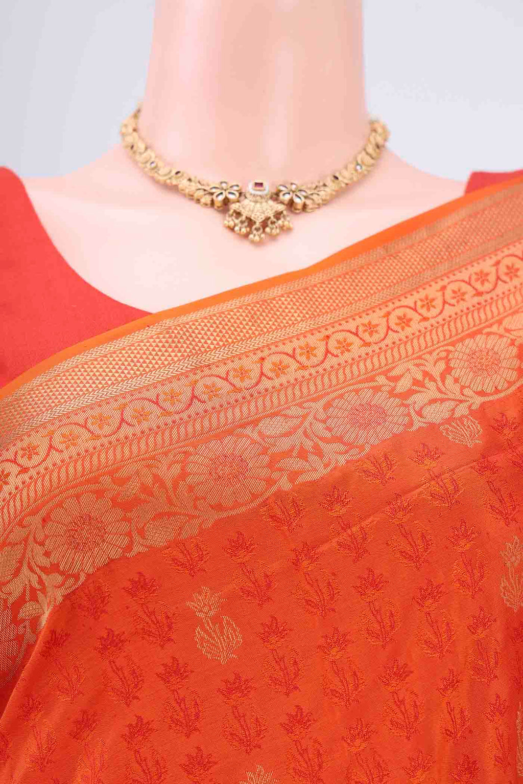 Border image of Orange Soft Silk Saree with Jacquard design on the body and Thread Border. 