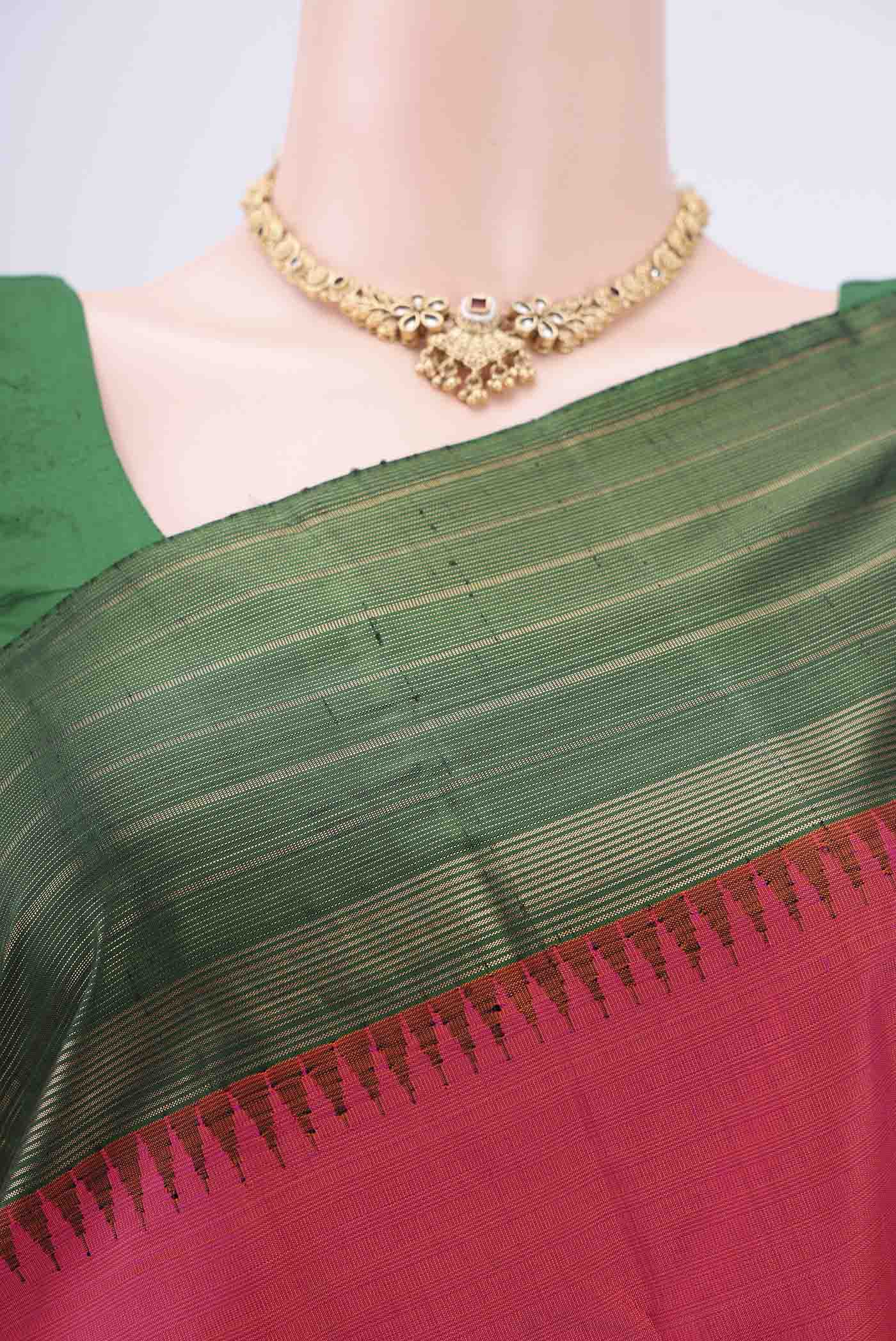 Border image of Dark Pink Kanjivaram Silk Saree with Jacquard design on the body and Zari Border. 