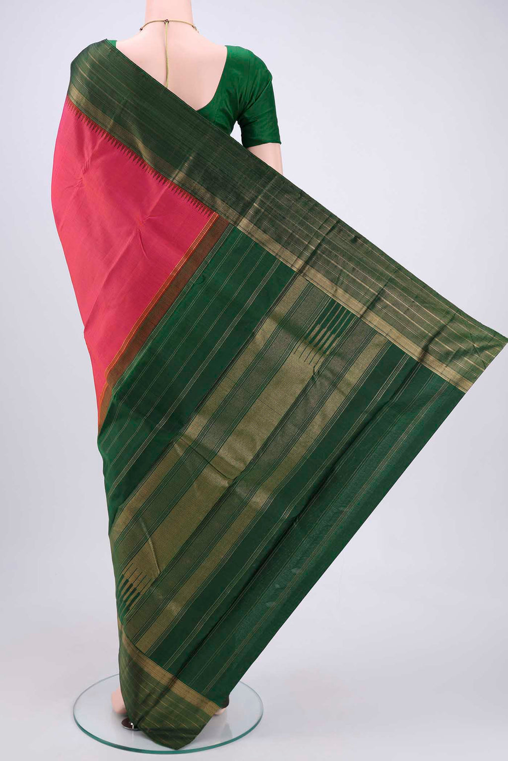 Flat view of Dark Pink Kanjivaram Silk Saree with Jacquard design on the body and Zari Border. 