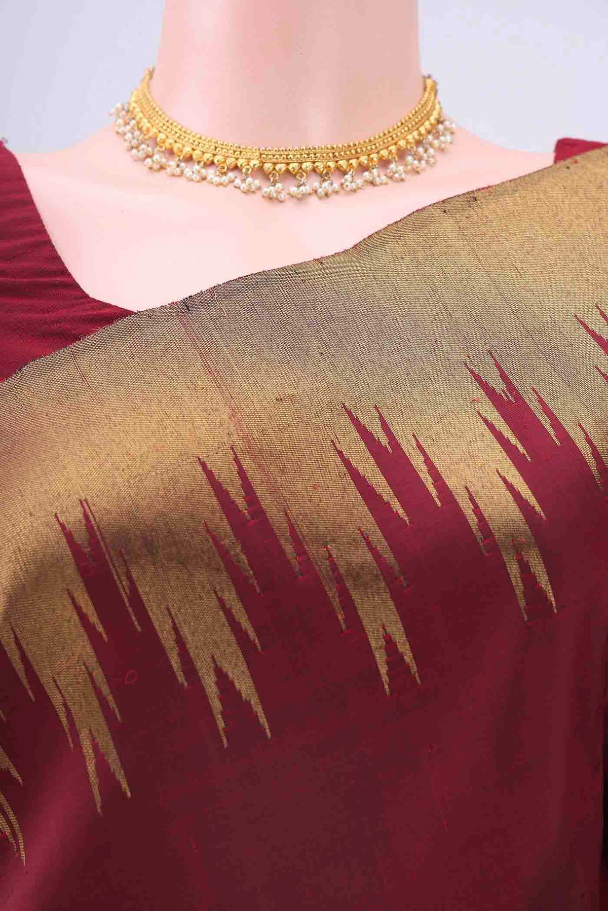 Border image of Pure Silk Pure Zari Maroon Kanchipuram Saree with Plain Body and Temple Border