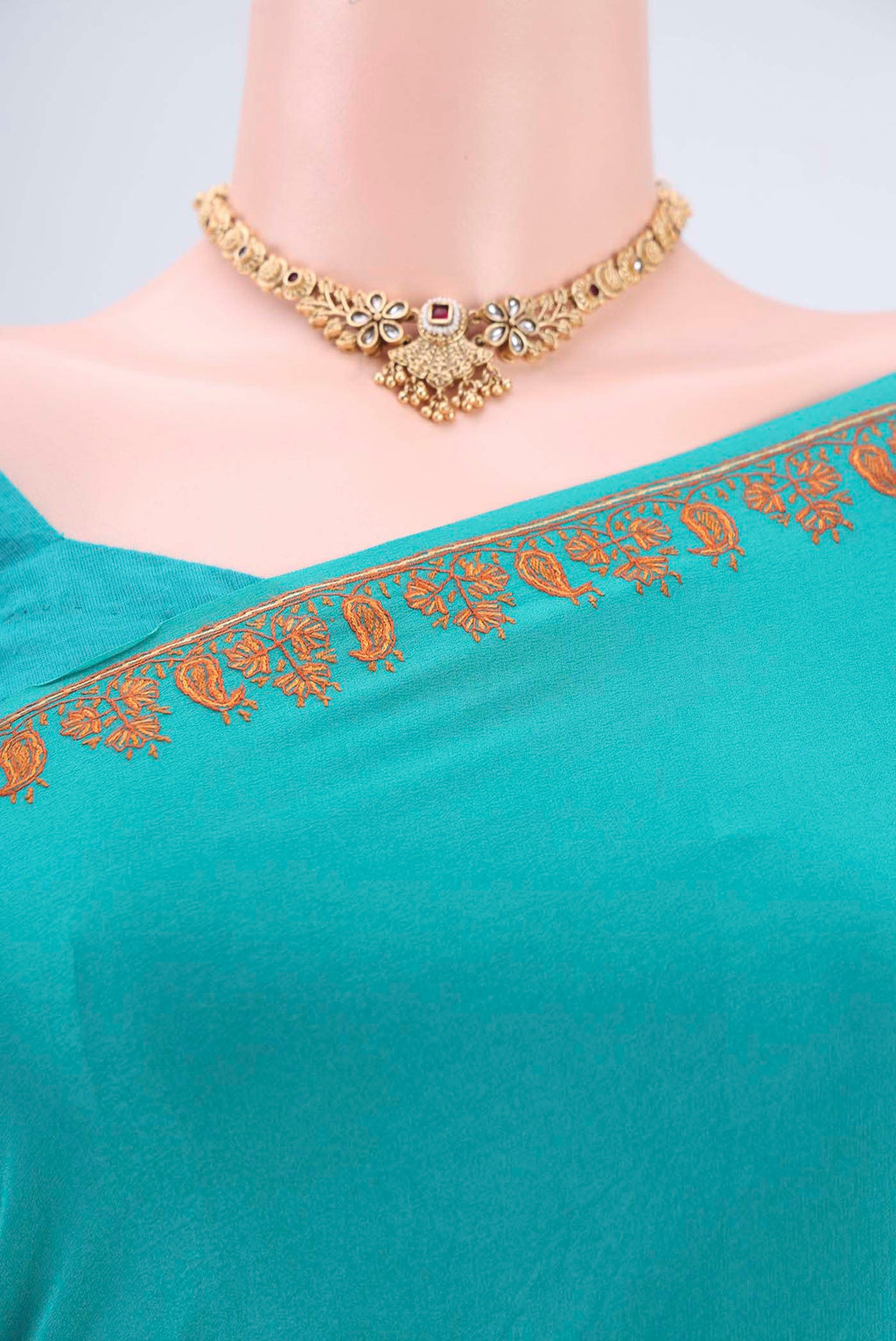 Border image of Turquoise Kashmiri Saree with Plain Body and Thread Border. 