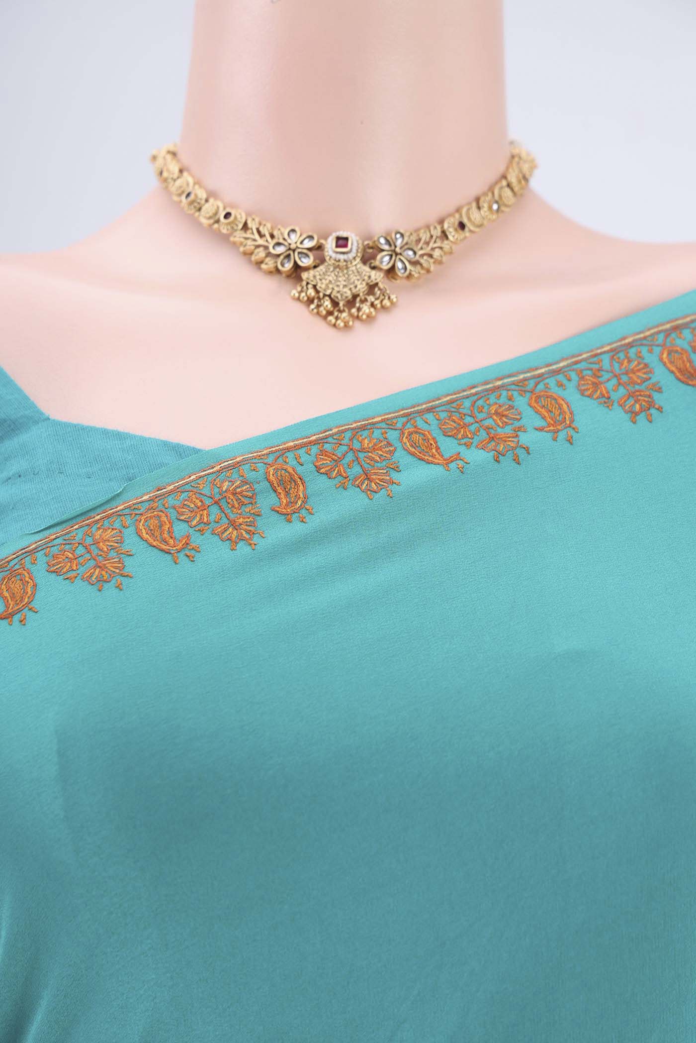 Border image of Turquoise Kashmiri Saree with Plain Body and Thread Border. 
