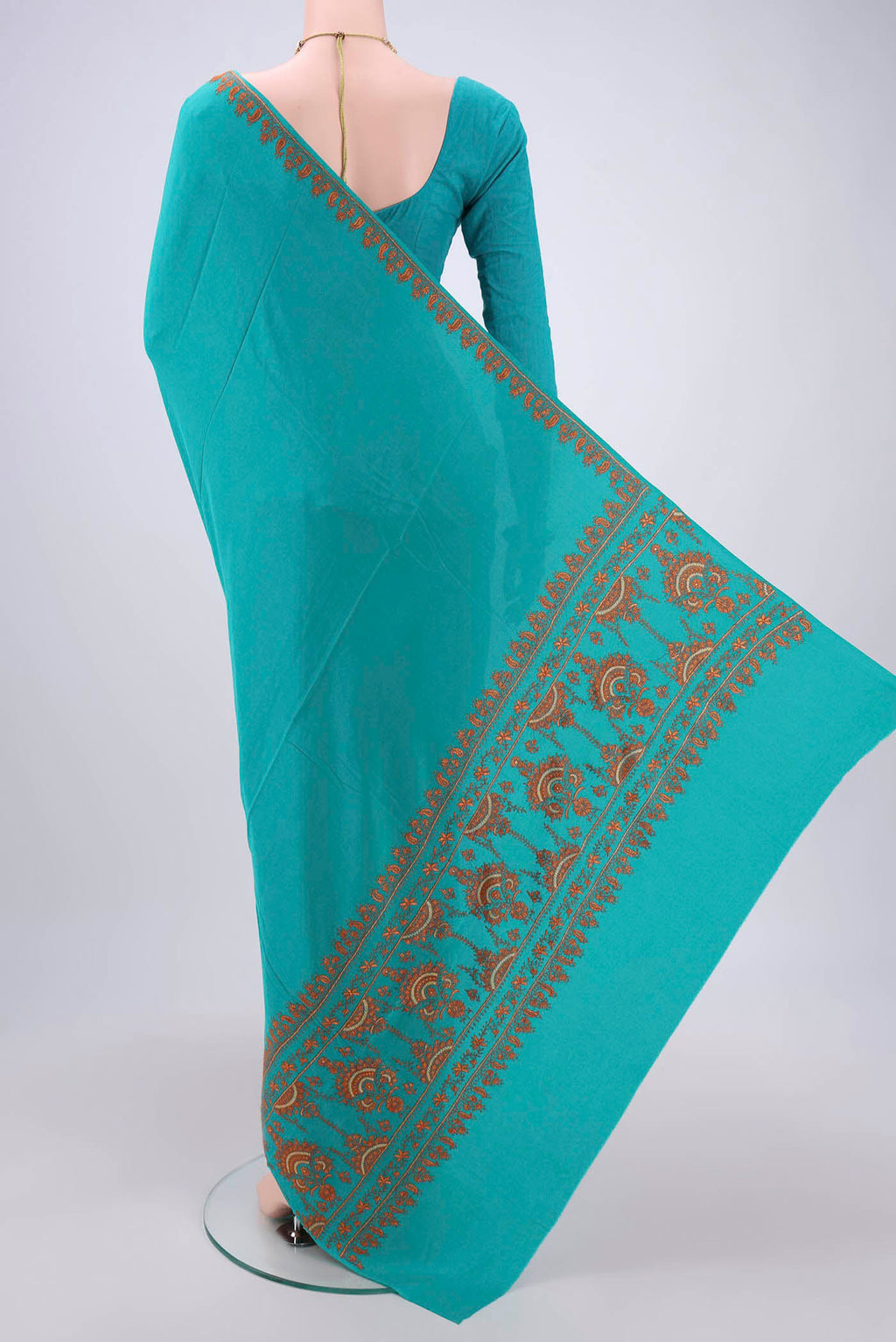 Flat view of Turquoise Kashmiri Saree with Plain Body and Thread Border. 