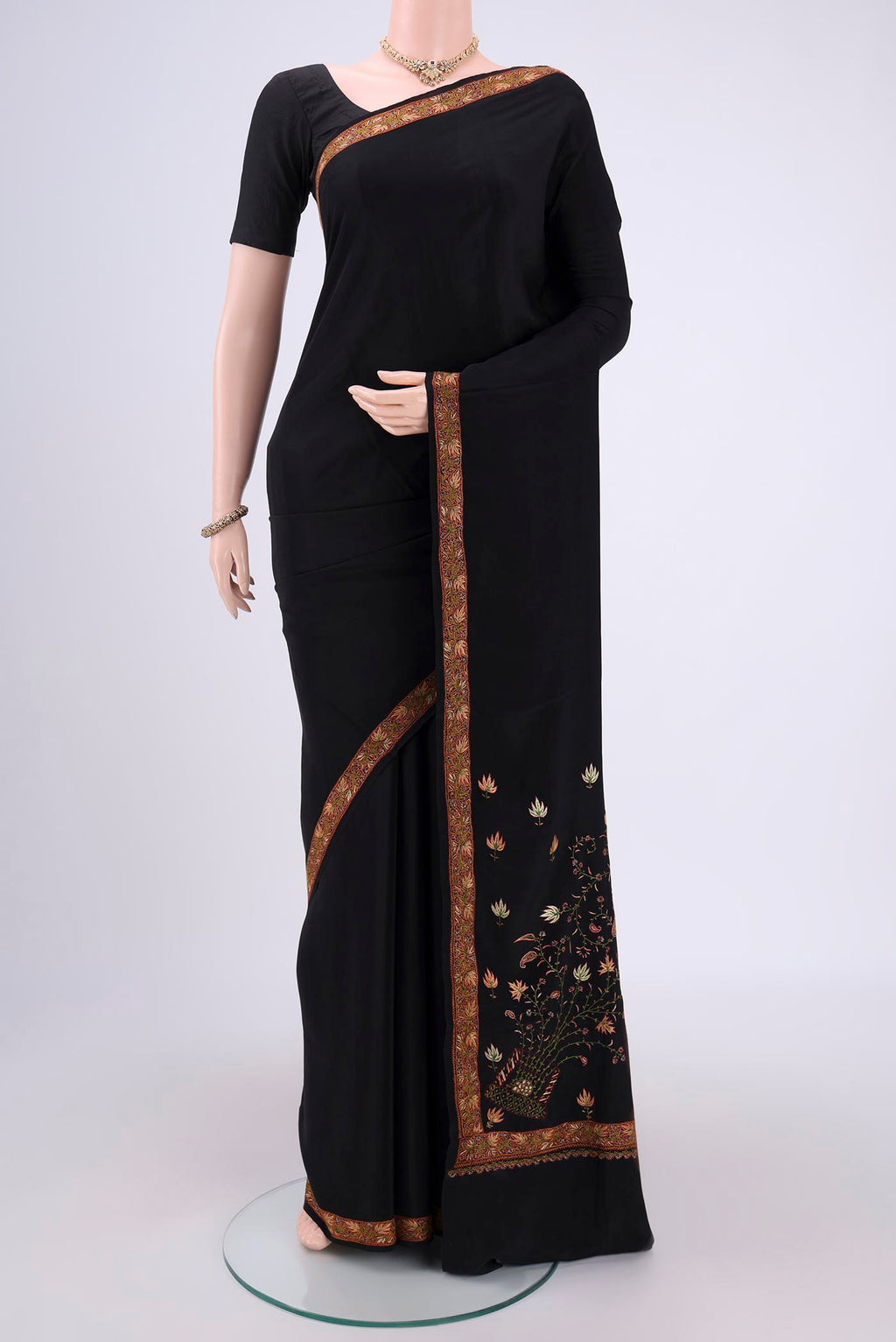 Black Kashmiri Saree with Plain Body and Thread Border.  displayed on a mannequin