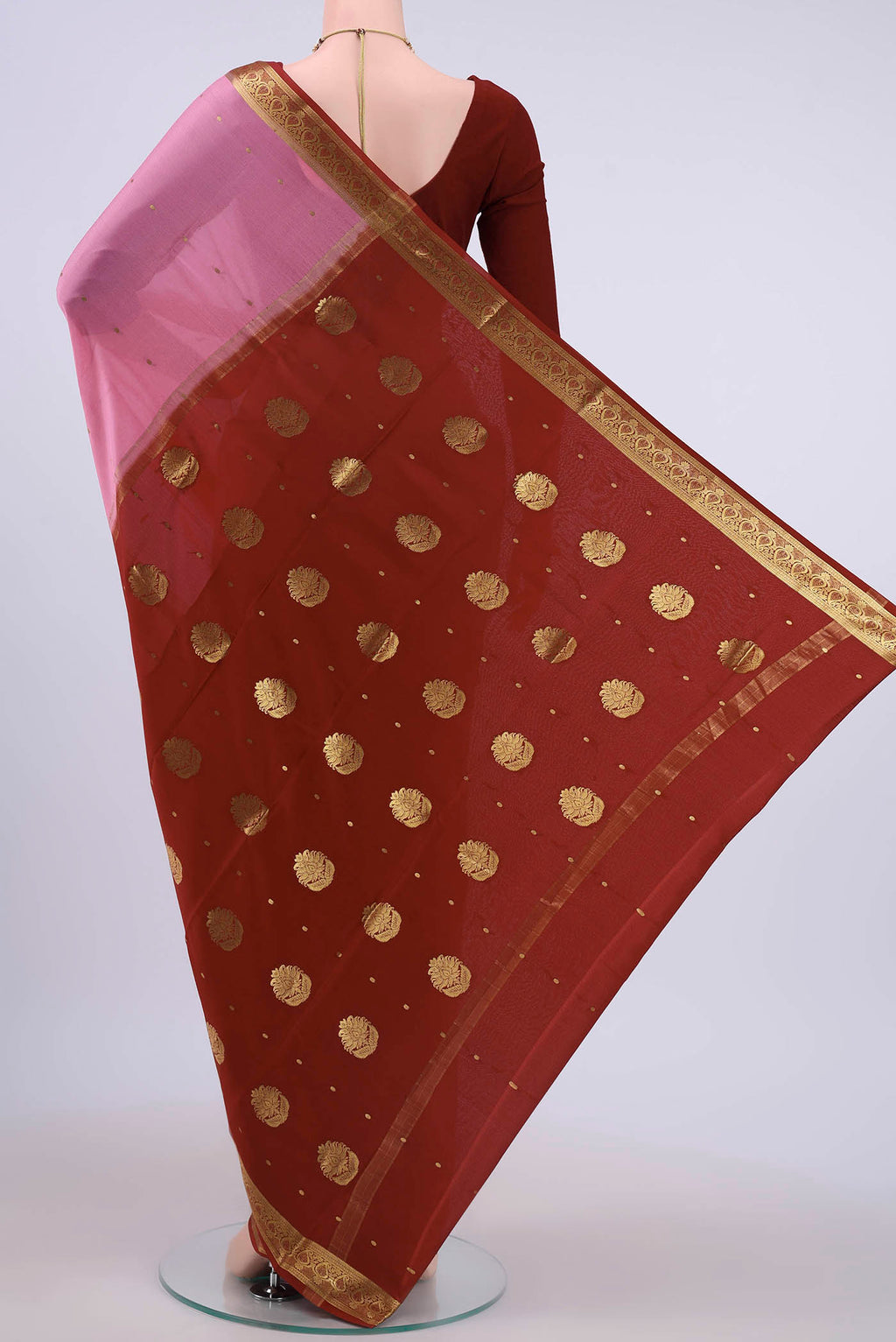Flat view of Rose pink Mysore Crepe Saree with Zari Butta on the body and Zari Border