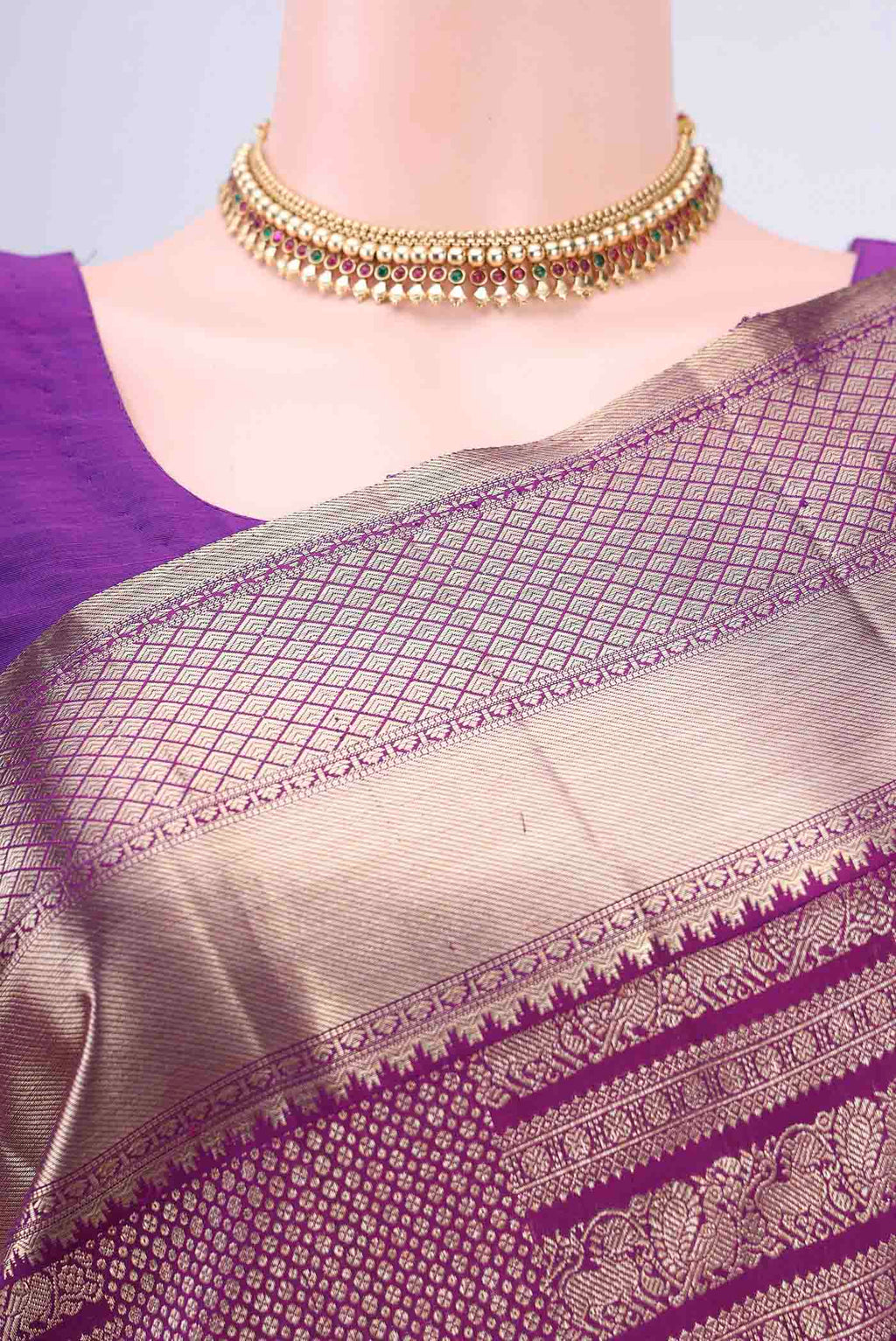 Border image of Purple Kanchipuram Saree with Zari Brocade on the body and Zari Border