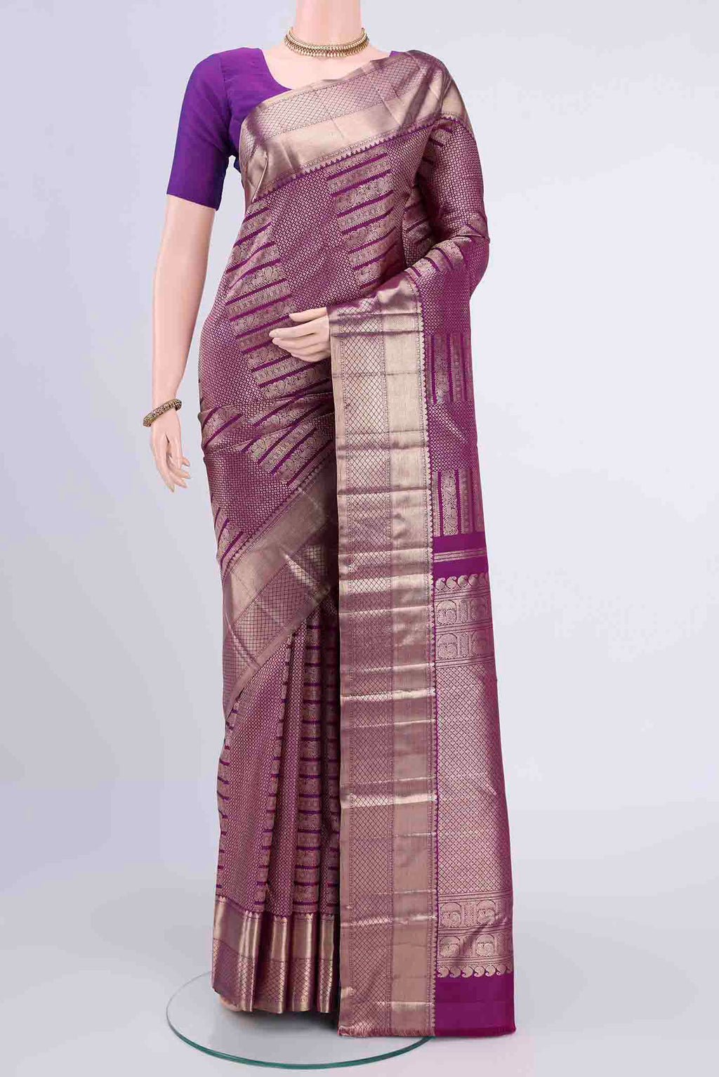 Purple Kanchipuram Saree with Zari Brocade on the body and Zari Border displayed on a mannequin