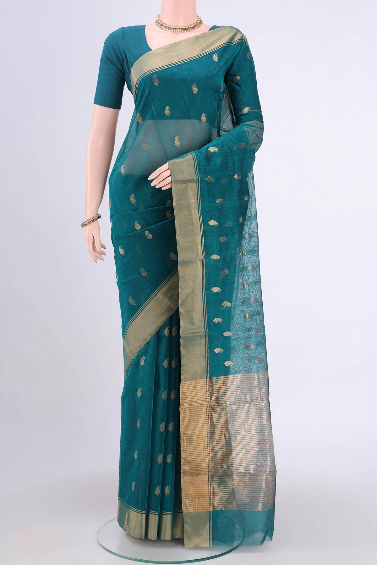 Sea Green Chanderi Silk Saree with Zari Butta on the body and Zari Border.  displayed on a mannequin