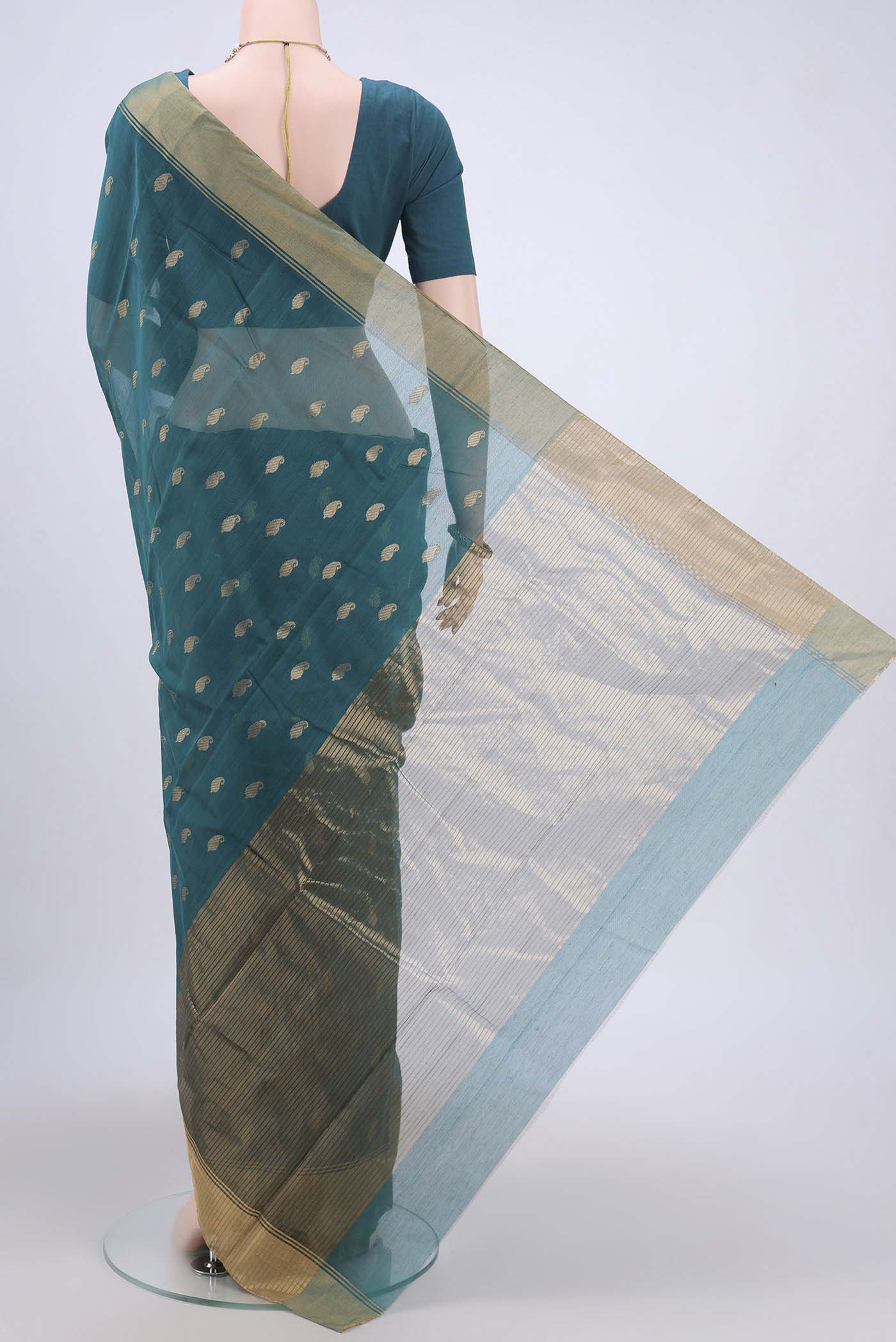 Flat view of Sea Green Chanderi Silk Saree with Zari Butta on the body and Zari Border. 