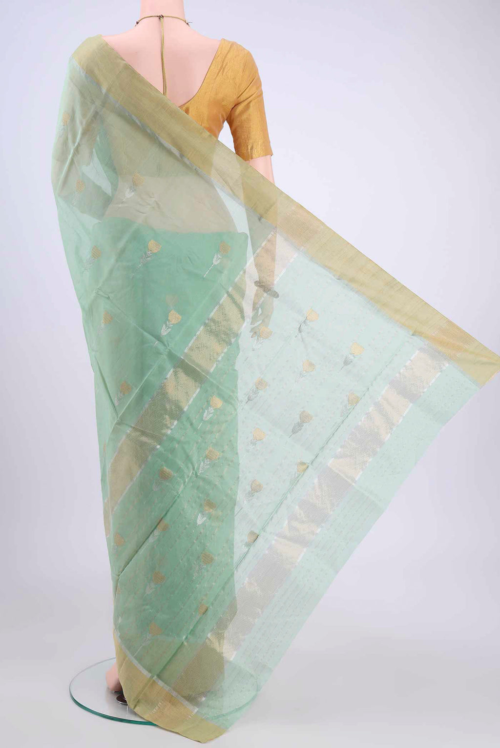Flat view of Light Green Chanderi Silk Saree with Zari Butta on the body and Zari Border