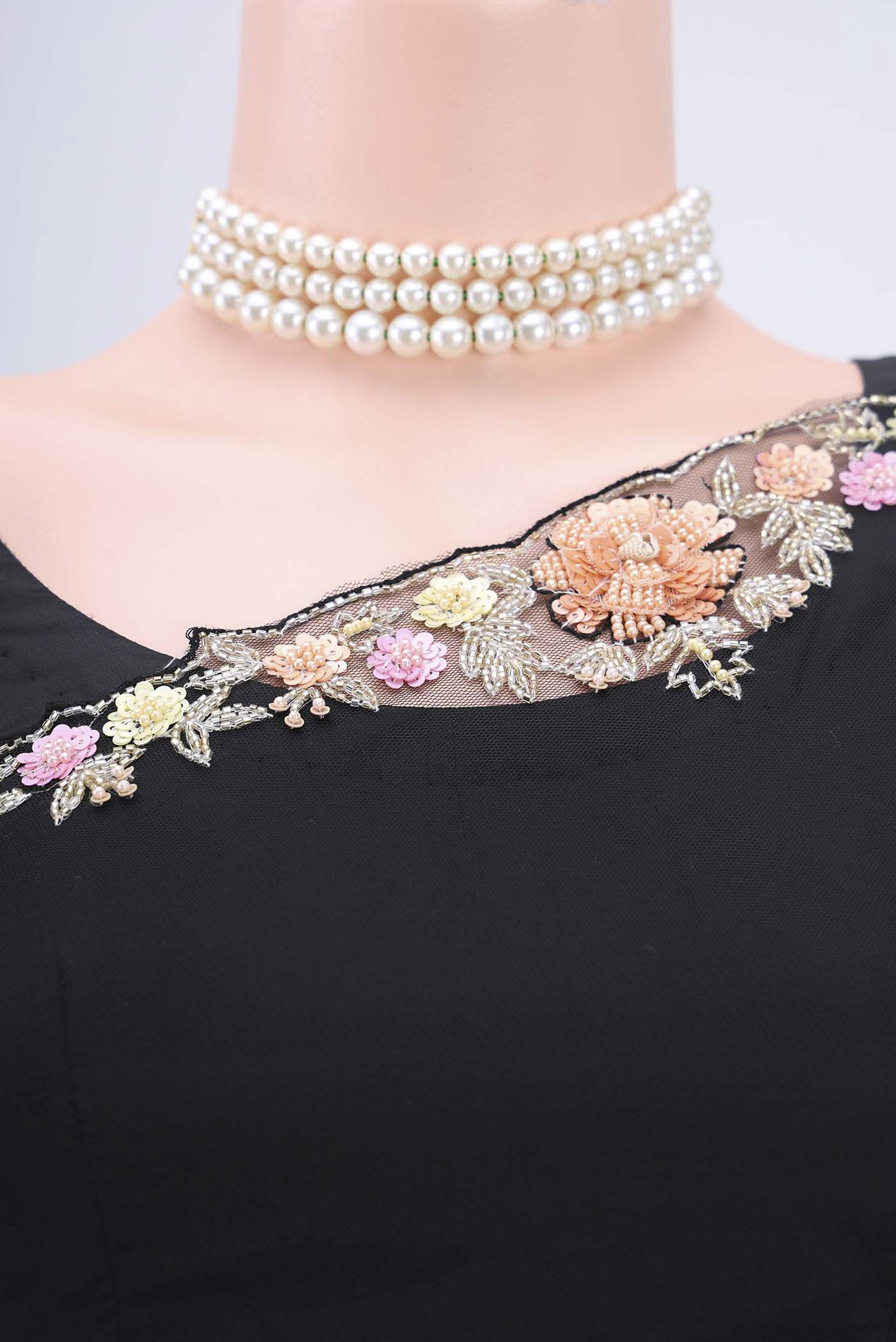 Border image of Black Organza Silk Saree with Embroidery on the body and Embroidery Border. 