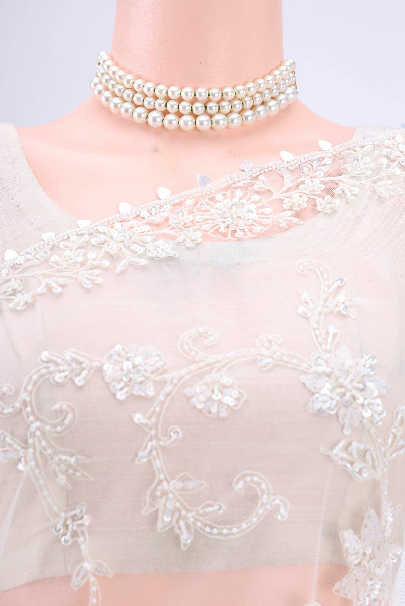 Border image of White Organza Silk Saree with Embroidery on the body and Embroidery Border. 