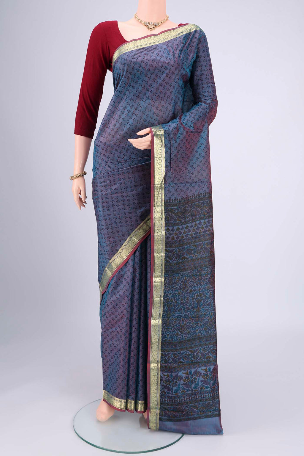 Purple Dual Tone Printed Silk Saree with Printed design on the body and Zari Border.  displayed on a mannequin