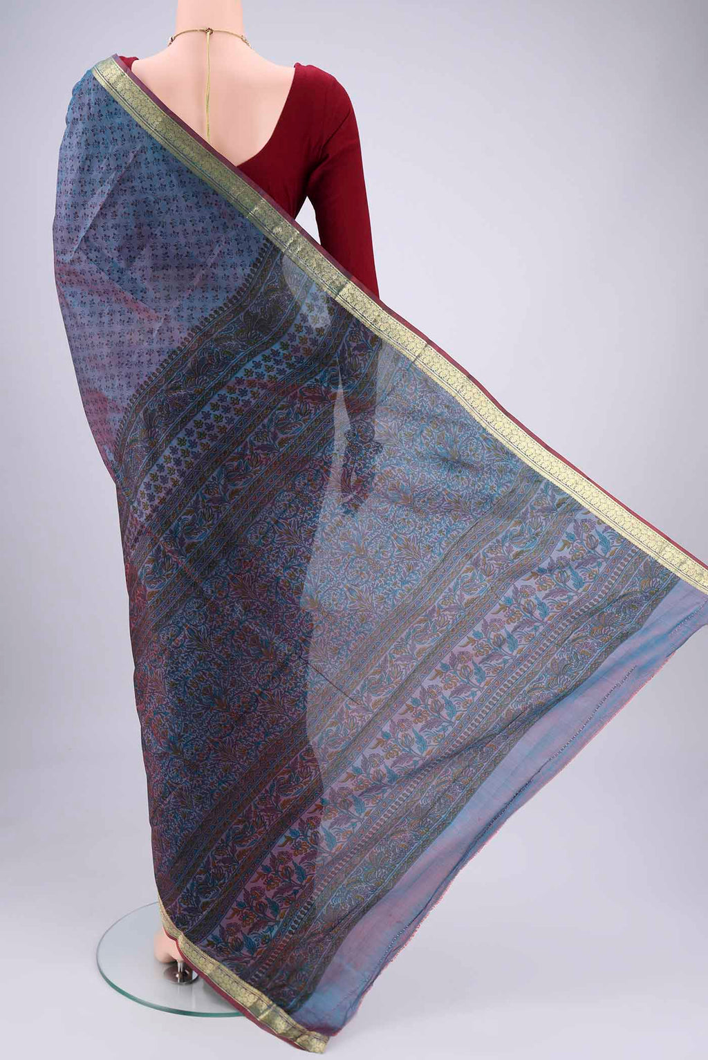 Flat view of Purple Dual Tone Printed Silk Saree with Printed design on the body and Zari Border. 
