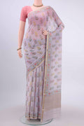 Lavender Mysore Georgette Saree with Floral Print on the body and Zari Border displayed on a mannequin
