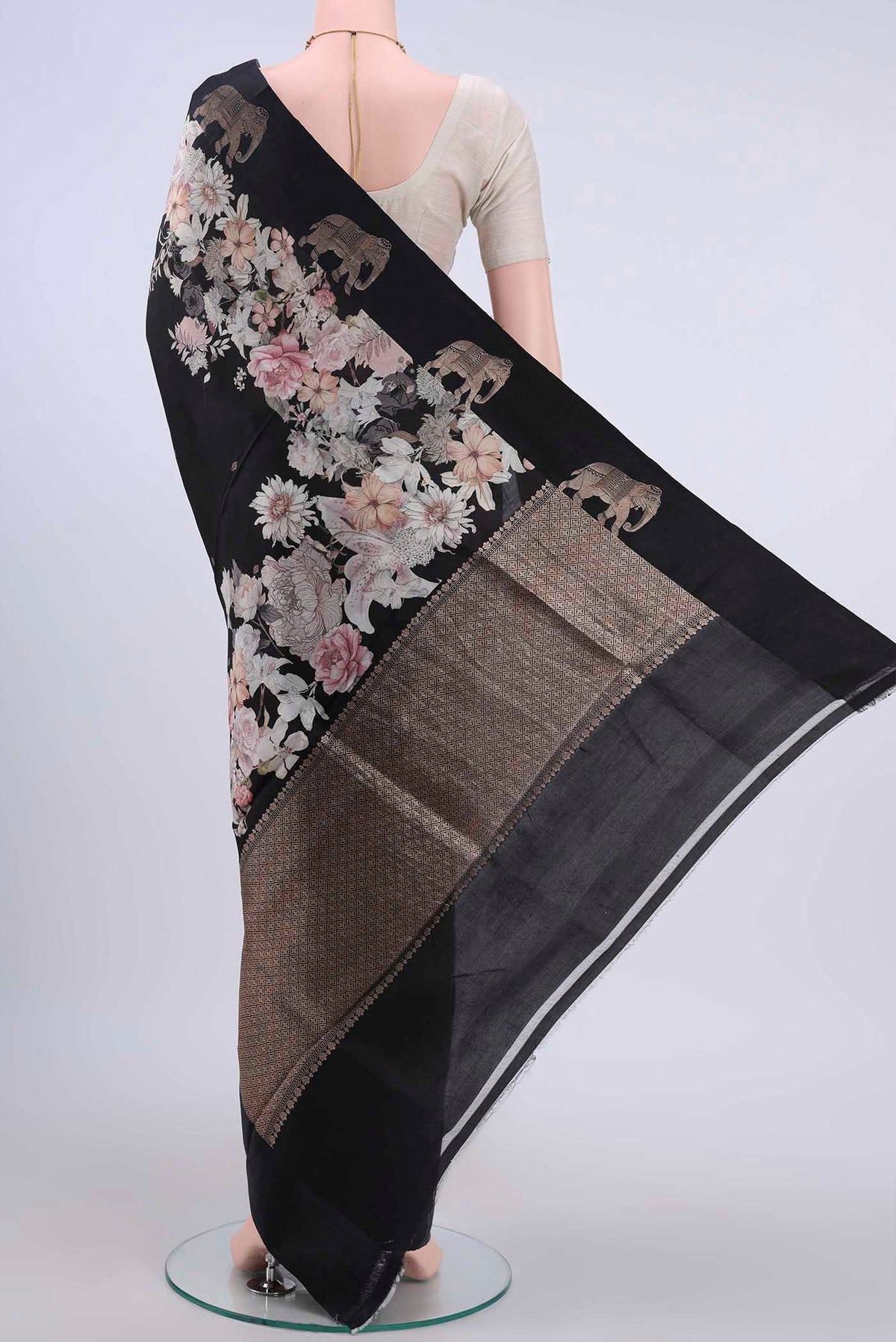 Flat view of Black Printed Silk Saree with Floral Print on the body and Satin Border