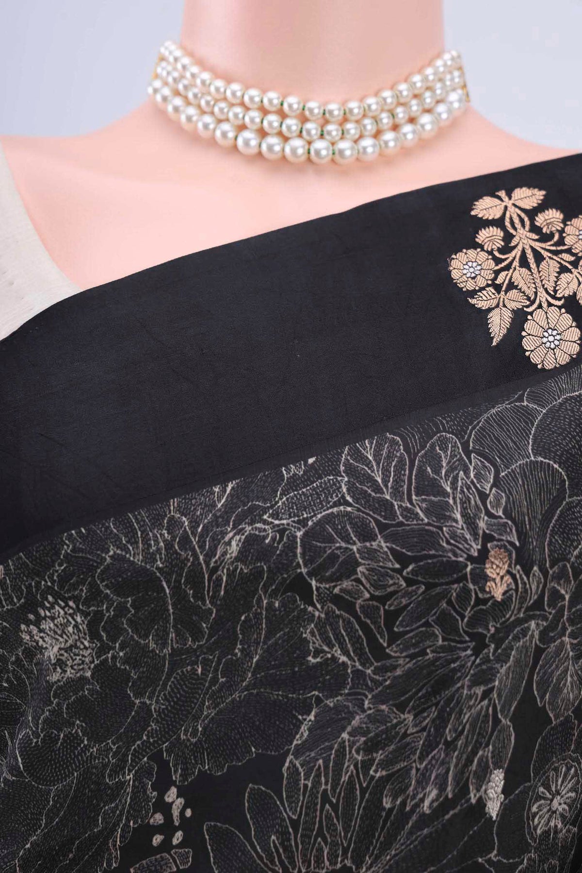 Border image of Black Printed Silk Saree with Floral Print on the body and Zari Border