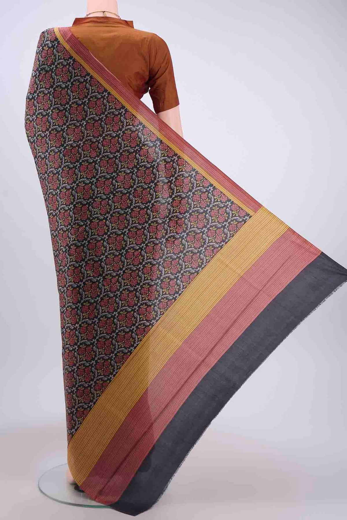 Flat view of Black Printed Silk Saree with Printed design on the body and Plain Border