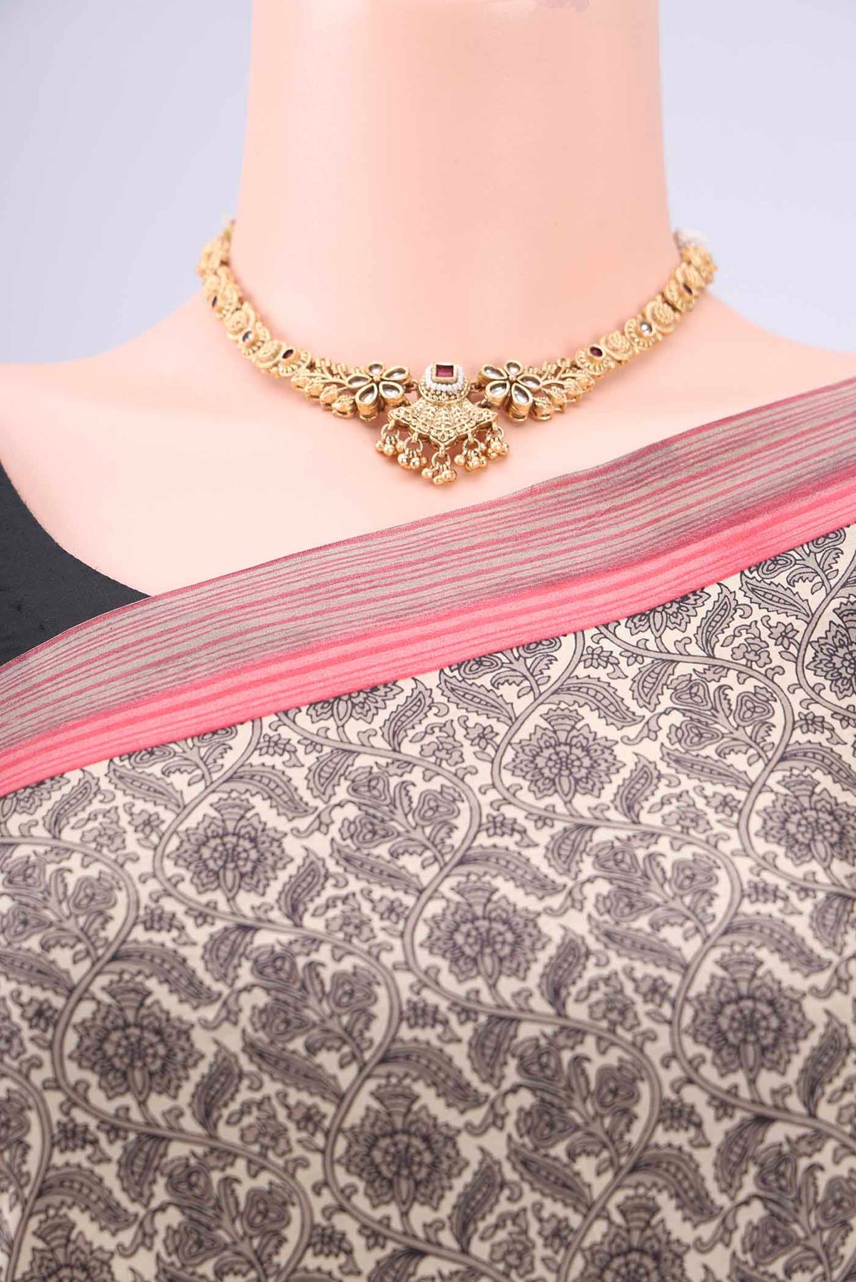 Border image of Off White Printed Silk Saree with Floral Print on the body and Printed Border. 