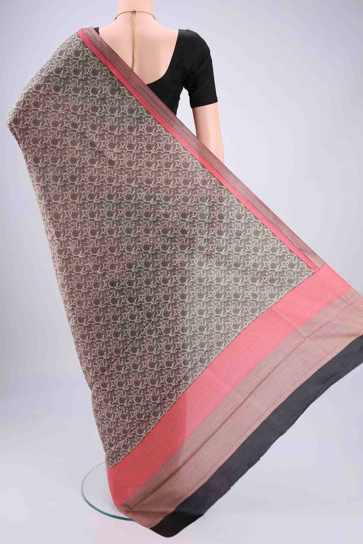Flat view of Off White Printed Silk Saree with Floral Print on the body and Printed Border. 