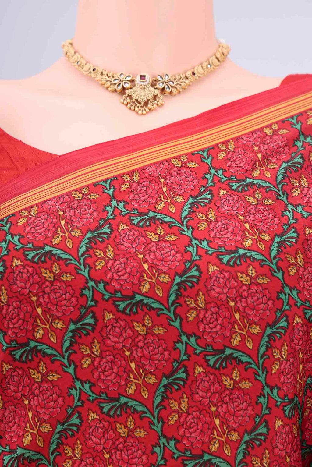 Border image of Red Printed Silk Saree with Floral Print on the body and Printed Border. 