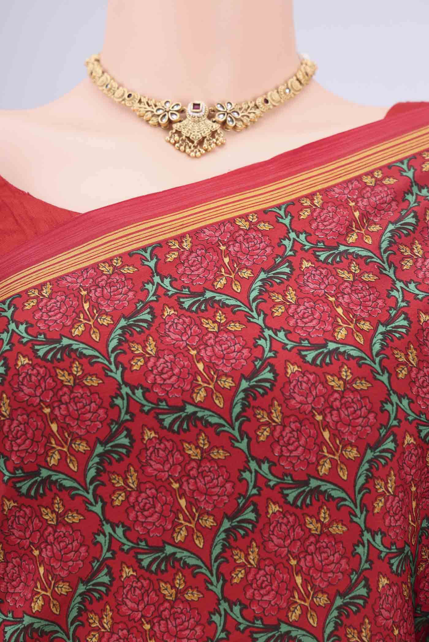 Border image of Red Printed Silk Saree with Floral Print on the body and Printed Border. 