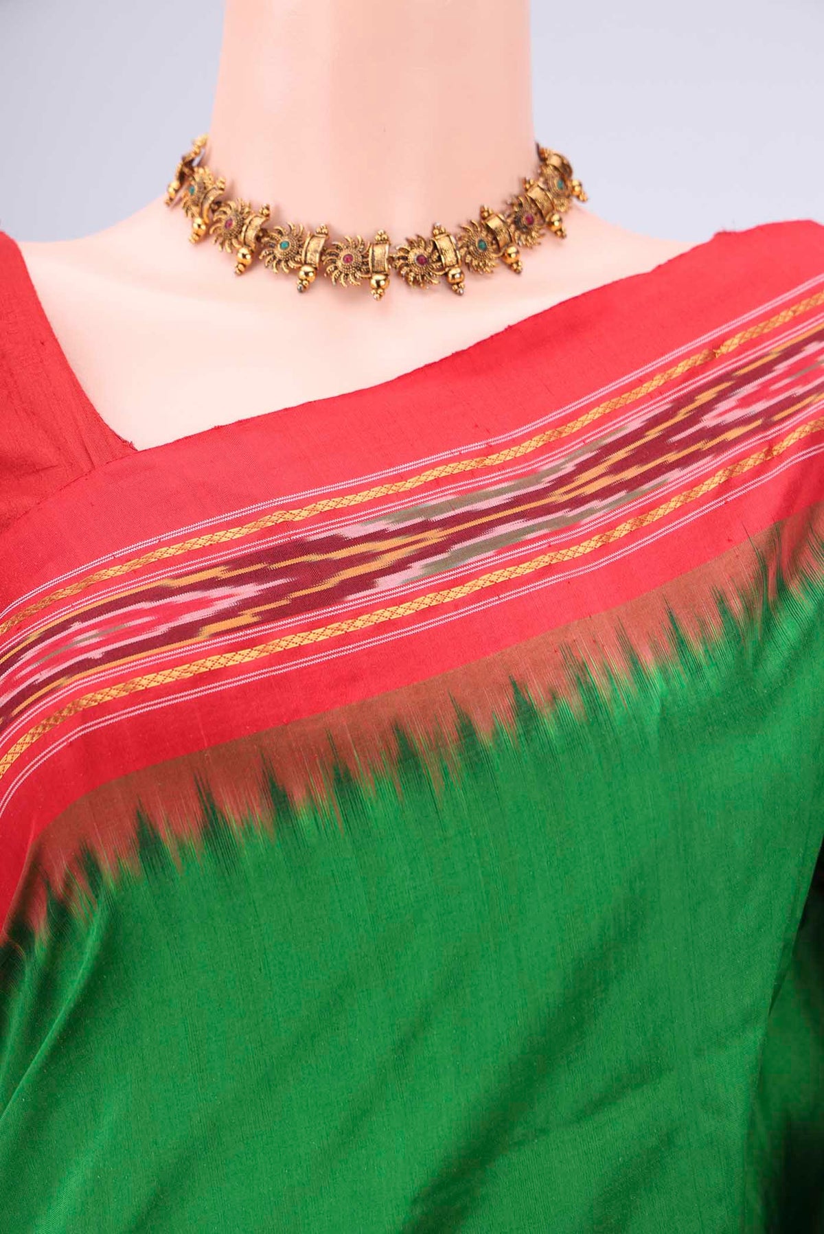 Border image of Green Pochampally Silk Saree with Plain Body and Ikat Border. 
