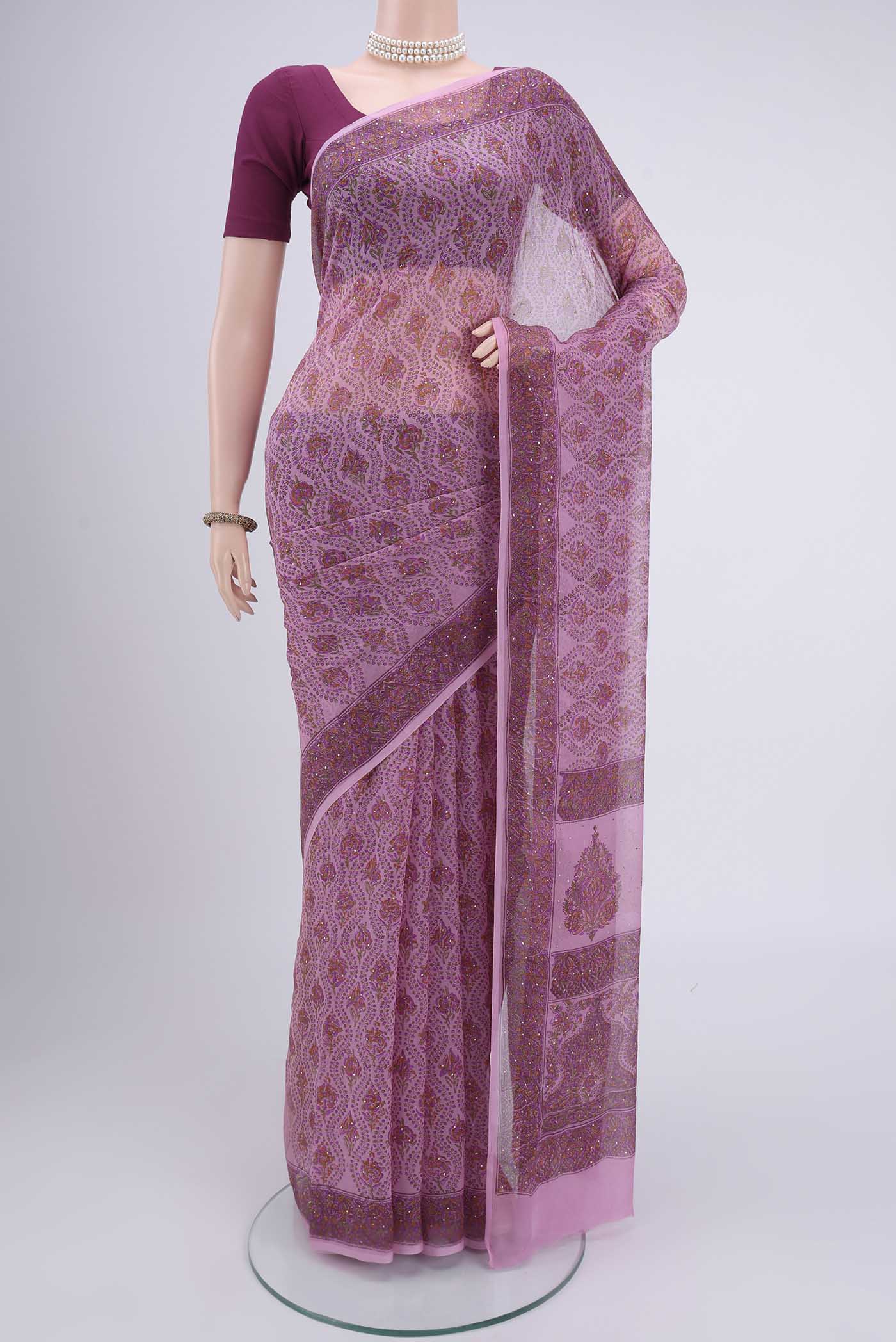 Rose pink Mysore Chiffon Saree with Floral Print on the body and Without Border.  displayed on a mannequin