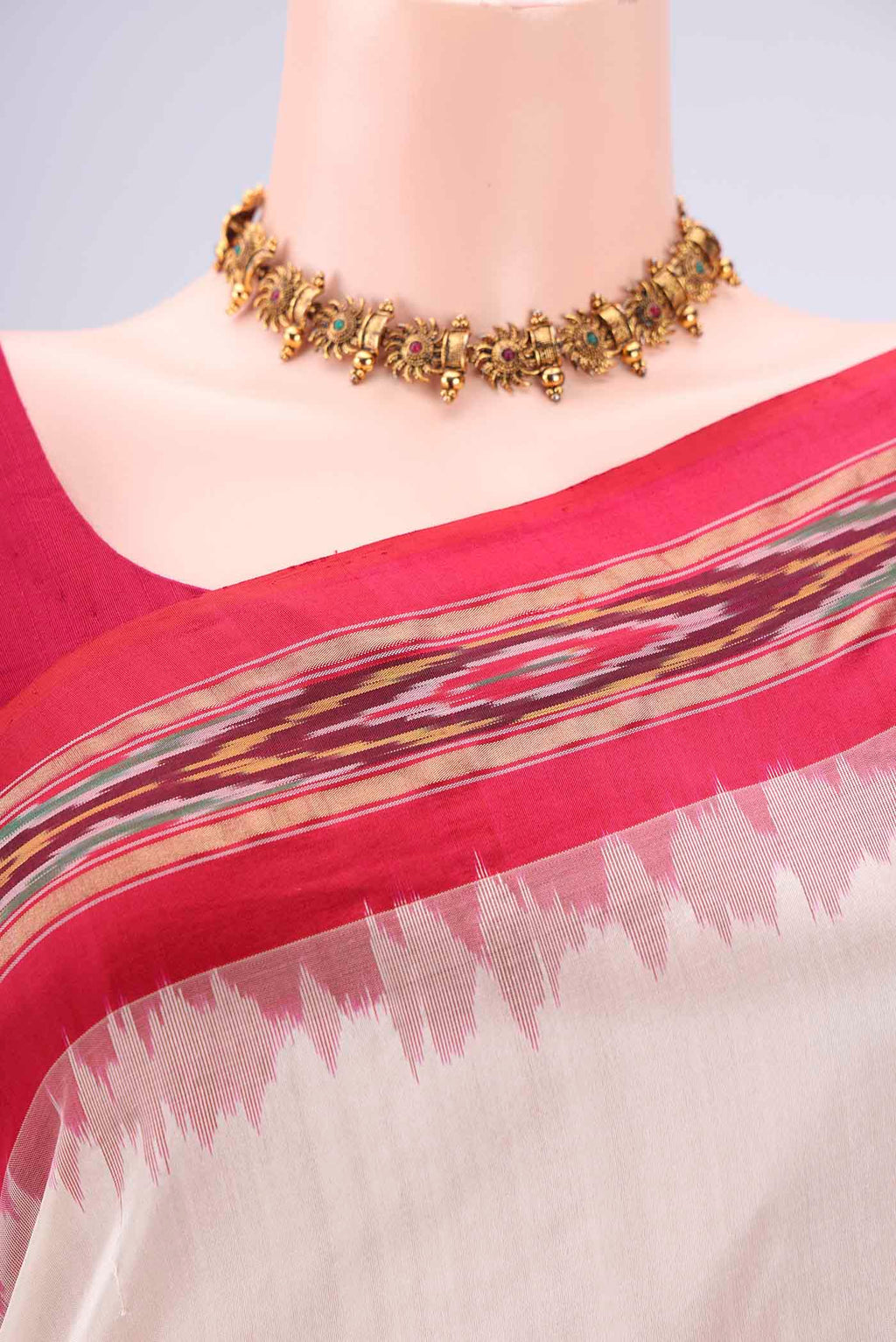 Border image of Off White Pochampally Silk Saree with Plain Body and Ikat Border. 