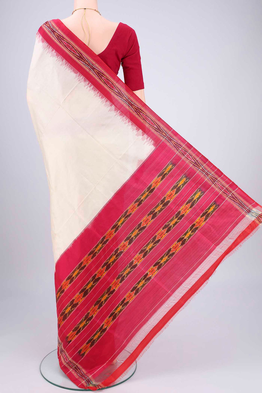 Flat view of Off White Pochampally Silk Saree with Plain Body and Ikat Border. 