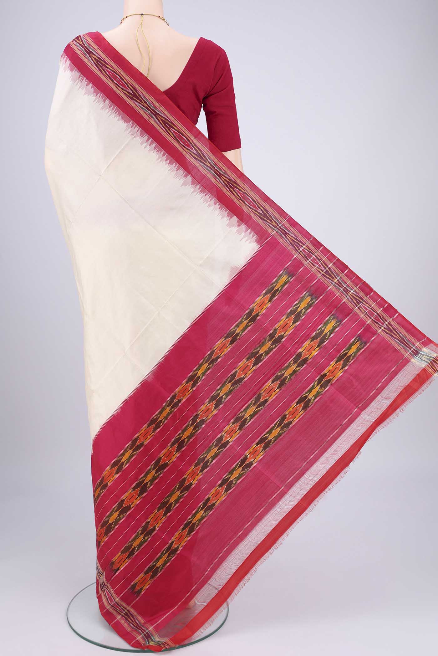 Flat view of Off White Pochampally Silk Saree with Plain Body and Ikat Border. 