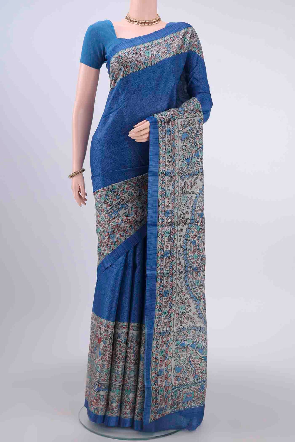Royal Blue Dual Tone Tussar Silk Saree with Printed design on the body and Printed Border displayed on a mannequin