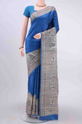 Royal Blue Dual Tone Tussar Silk Saree with Printed design on the body and Printed Border displayed on a mannequin