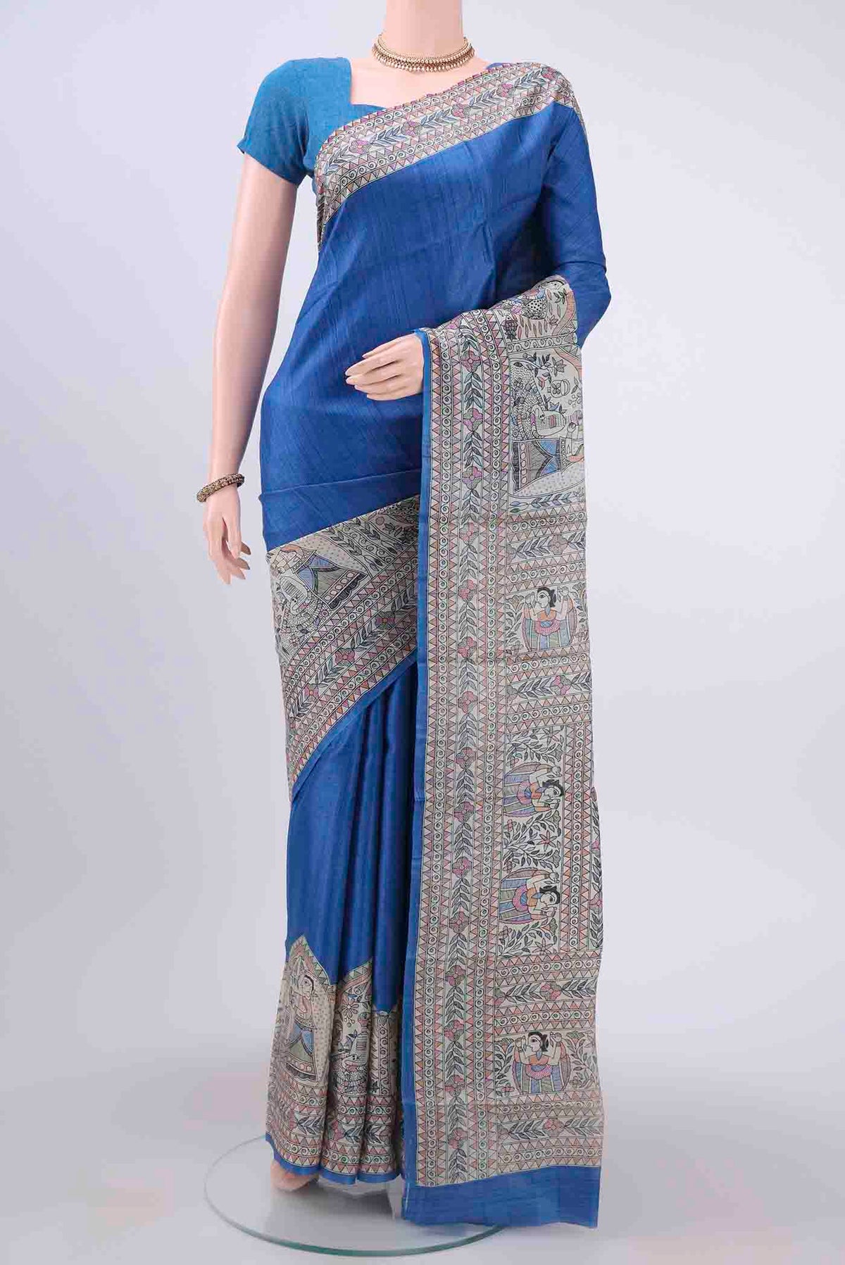 Royal Blue Dual Tone Tussar Silk Saree with Printed design on the body and Printed Border displayed on a mannequin