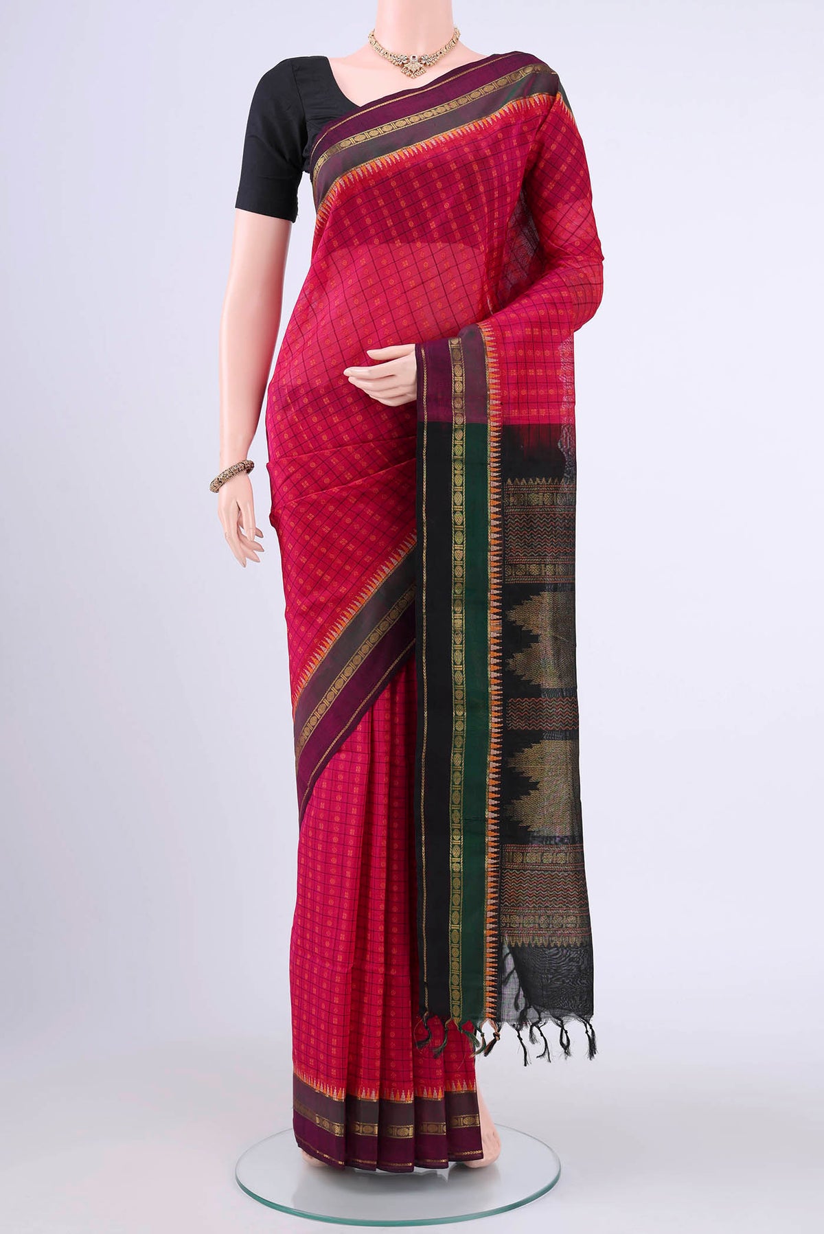 Pink Coimbatore Silk Cotton Saree with Checked design on the body and Zari Border displayed on a mannequin