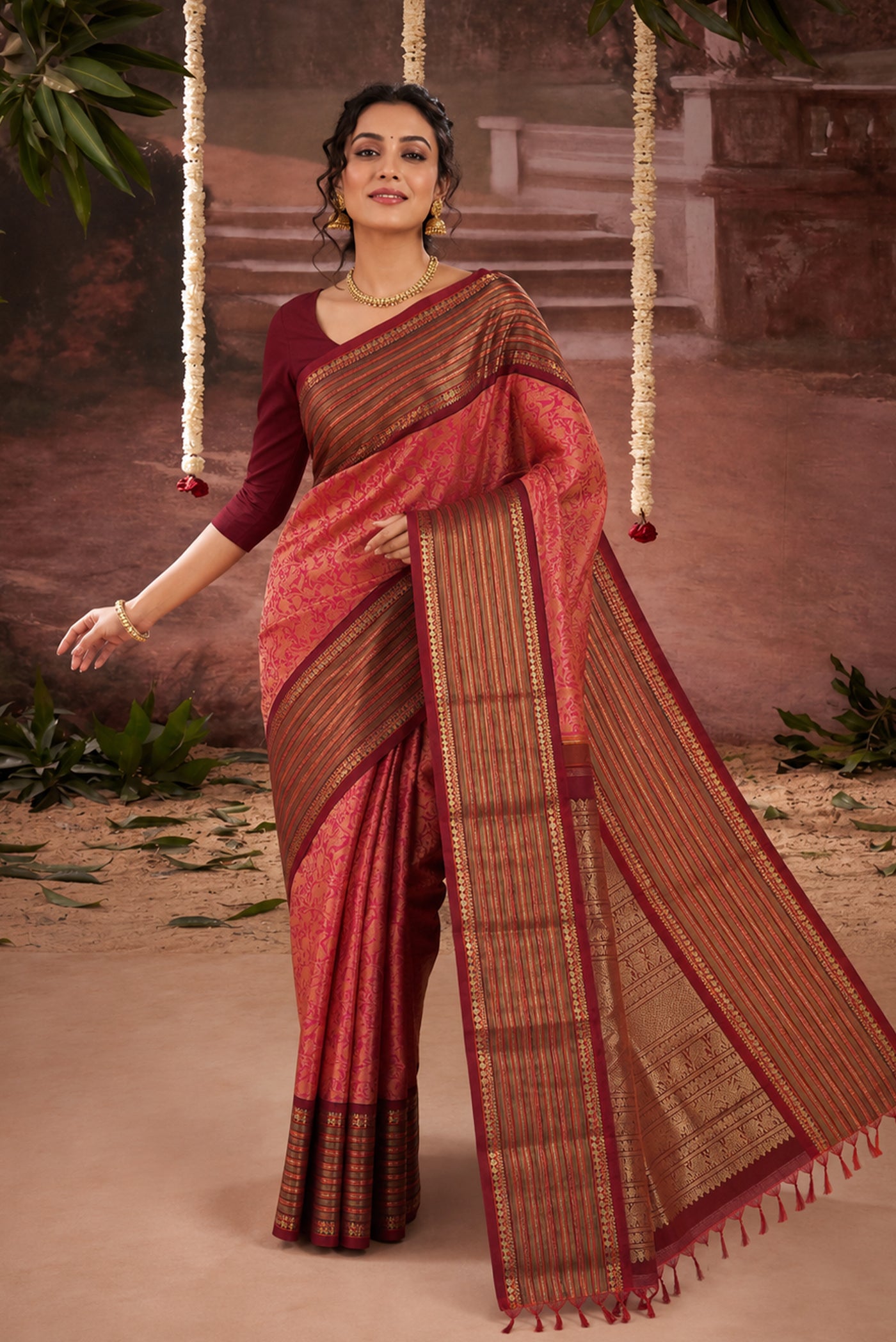 Model wearing a Pure Silk Pure Zari Multi Color Kanchipuram Saree with Zari Brocade on the body and Zari Border.