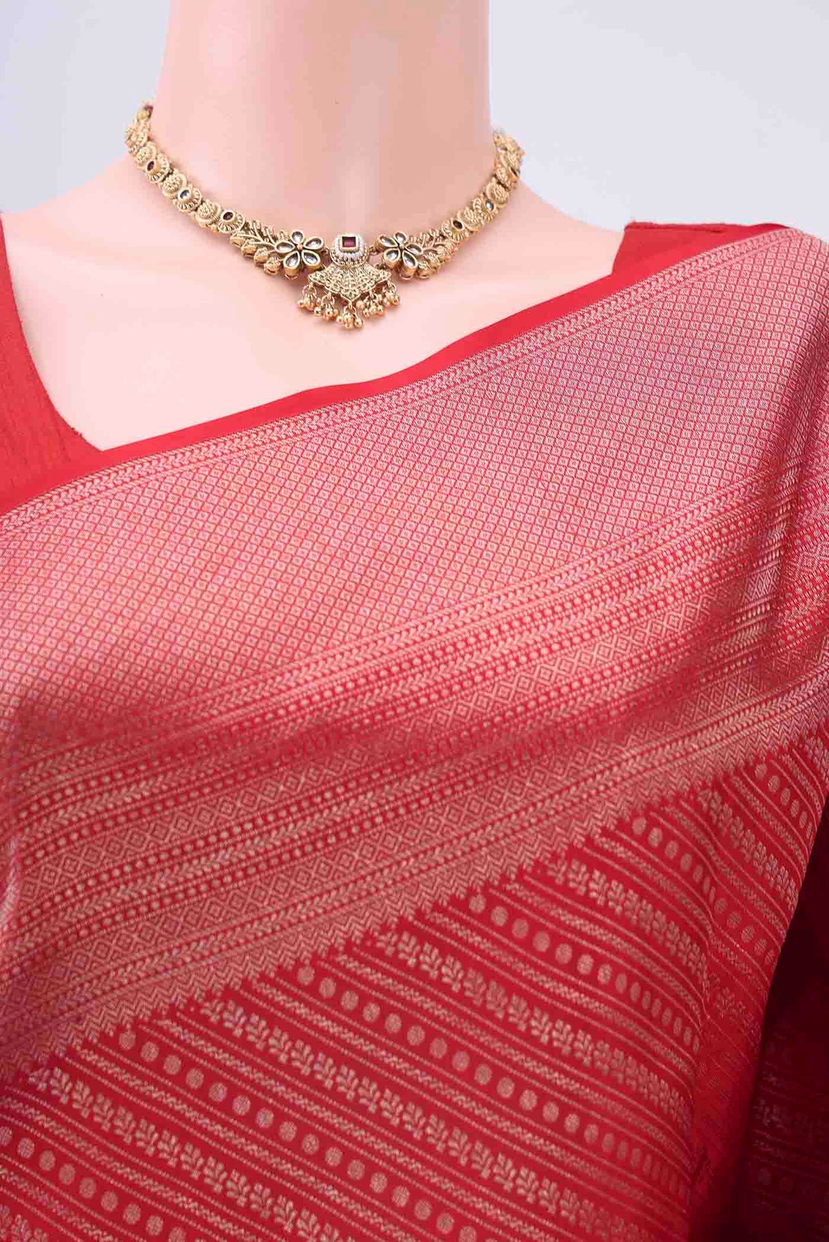 Border image of Red Kanchipuram Silk Saree with Zari Brocade on the body and Zari Border