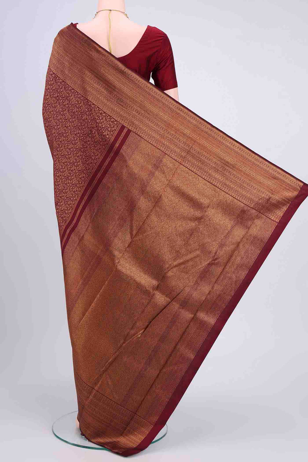 Flat view of Maroon Kanchipuram Saree with Zari Brocade on the body and Zari Border