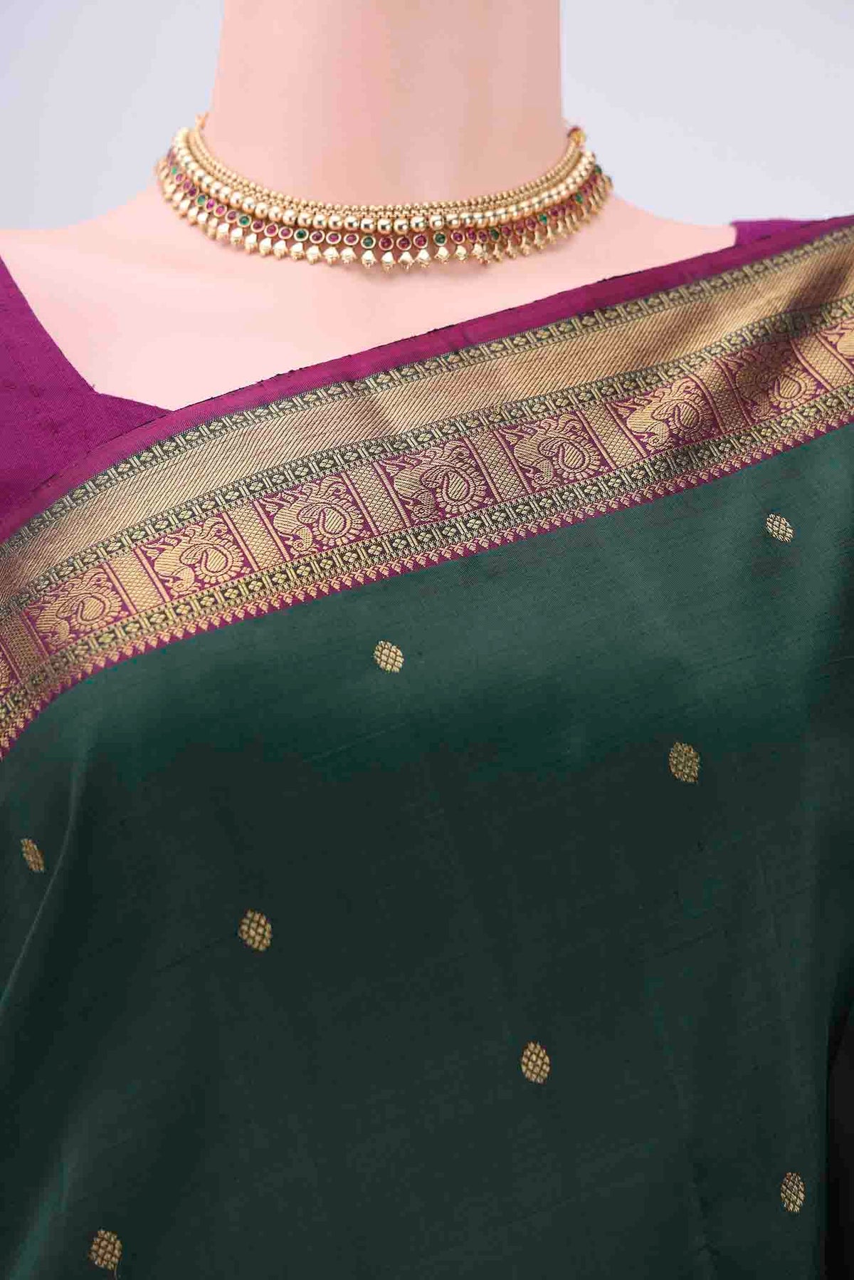 Border image of Bottle Green Dual Tone Kanchipuram Saree with Zari Butta on the body and Zari Border