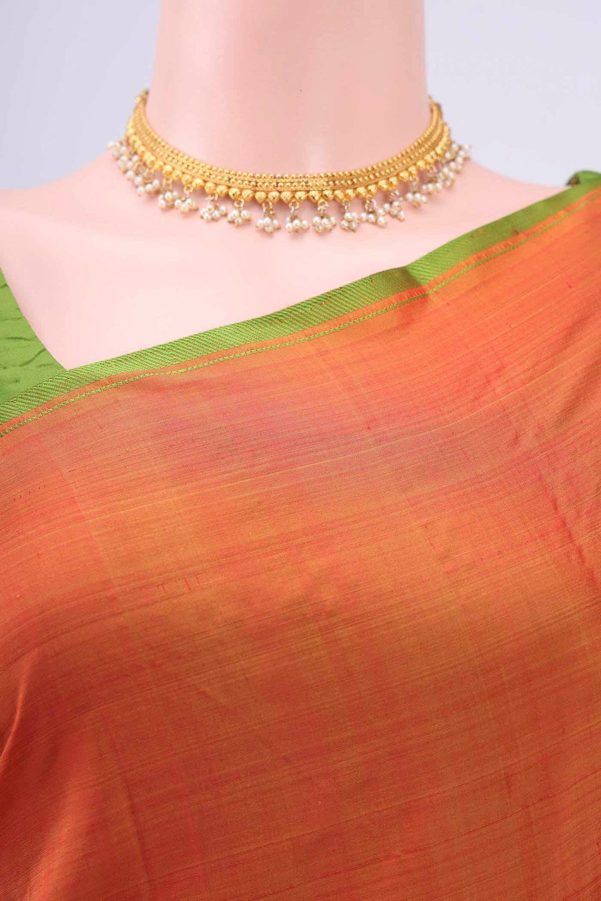 Border image of Brick Orange Kanchipuram Silk Saree with Thread Butta on the body and Thread Border