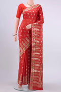 Red Banarasi Tussar Silk Saree with Zari Butta on the body and Zari And Thread Border displayed on a mannequin