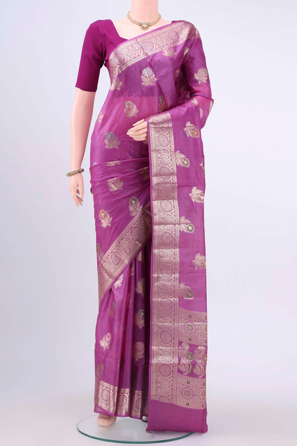Purple Banarasi Tussar Silk Saree with Zari And Thread Butta on the body and Zari Border displayed on a mannequin